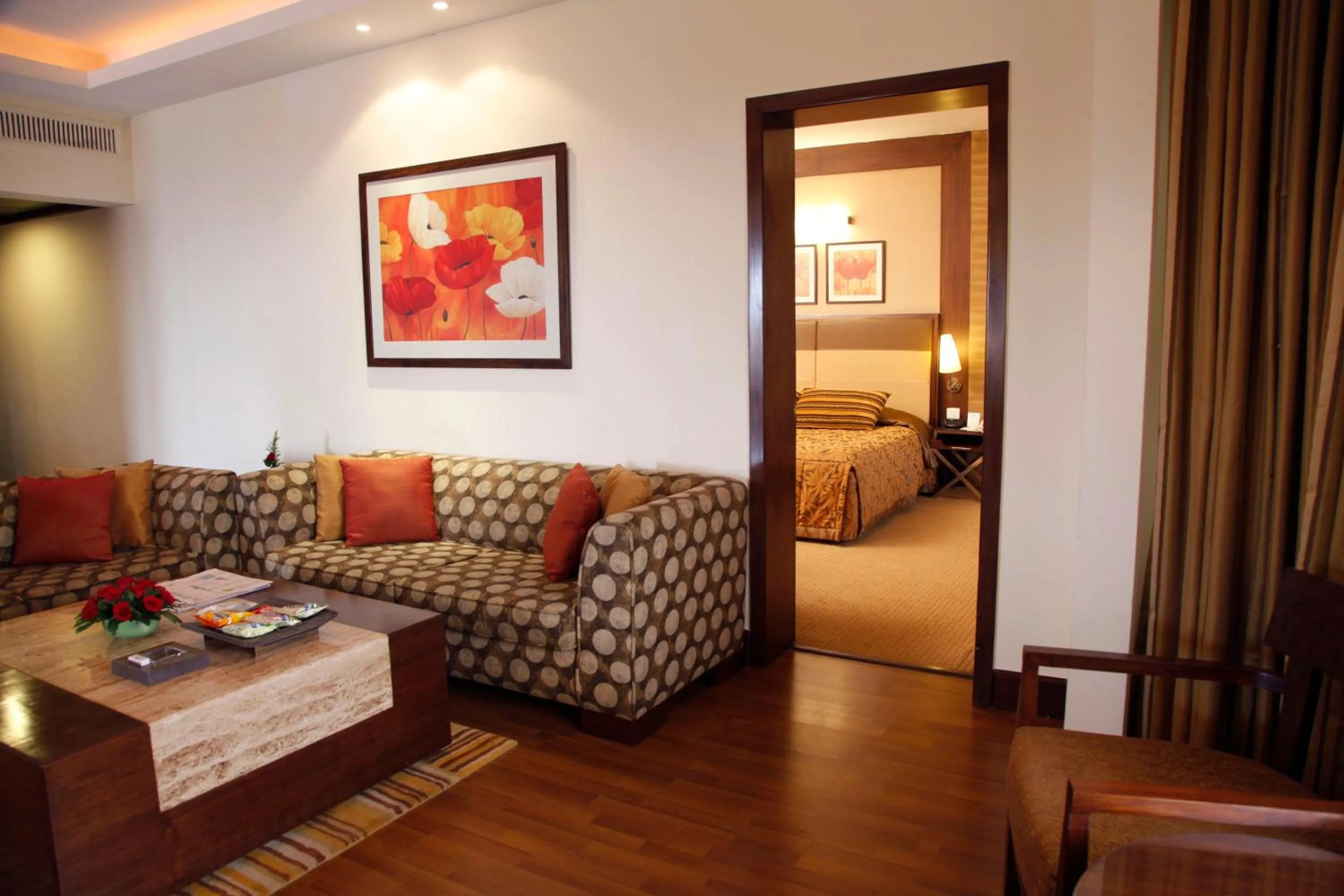 Living room, Bed in The Retreat Hotel & Convention Centre