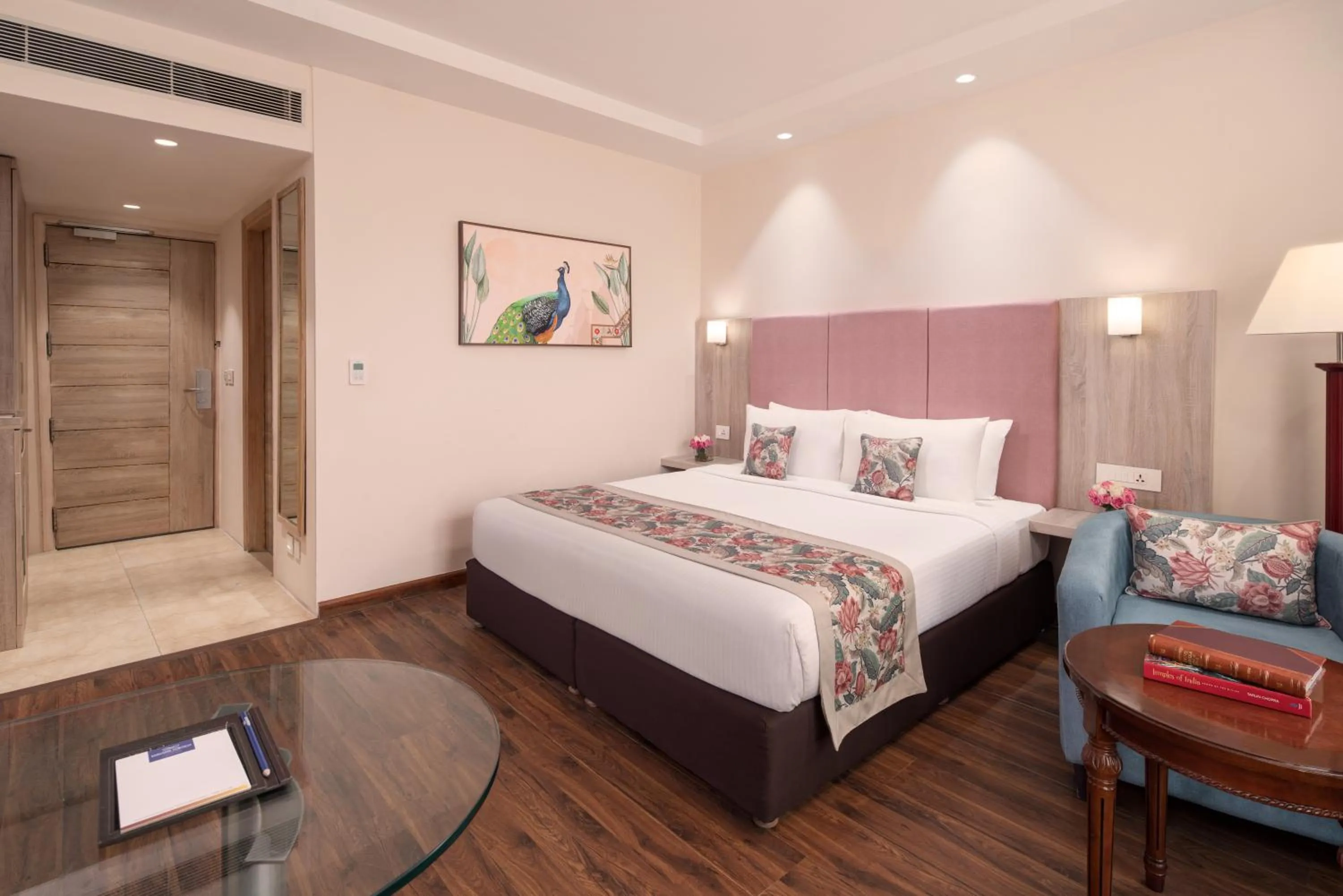 Photo of the whole room, Bed in Nidhivan Sarovar Portico Vrindavan