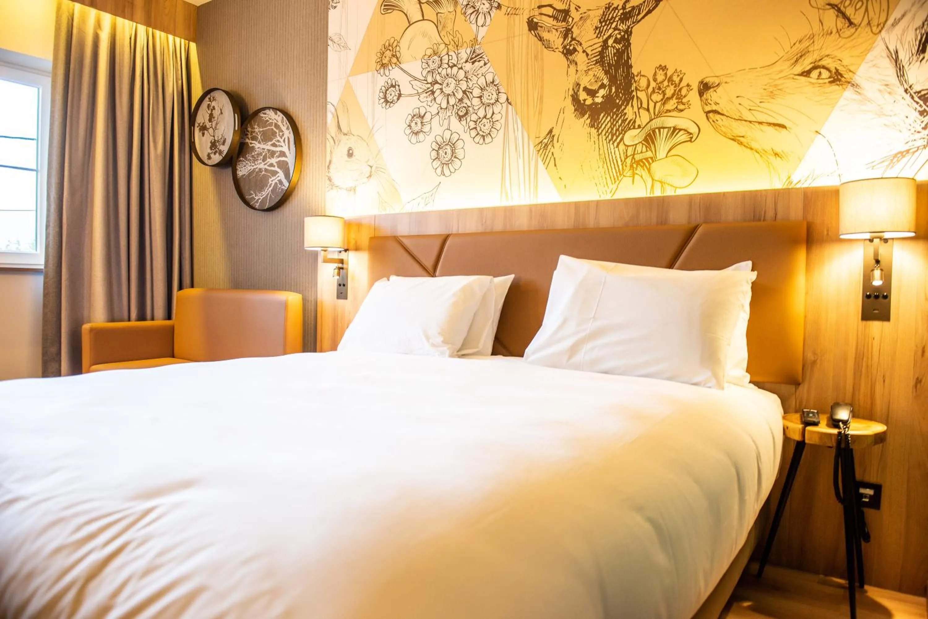 Bed in Mercure Han-sur-Lesse