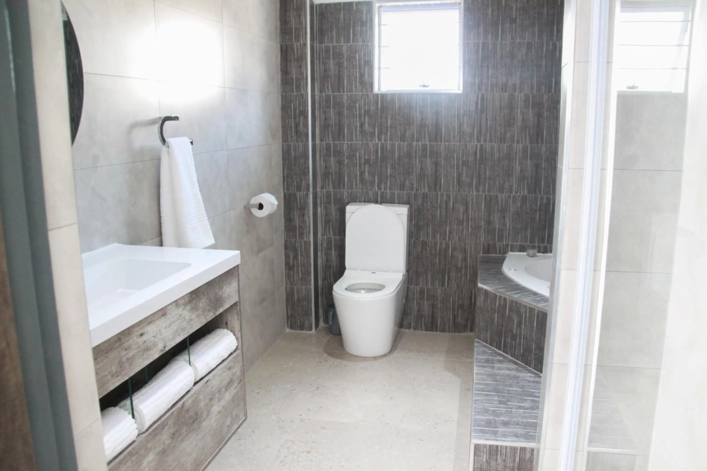 Bathroom in The Cato Suites Hotel