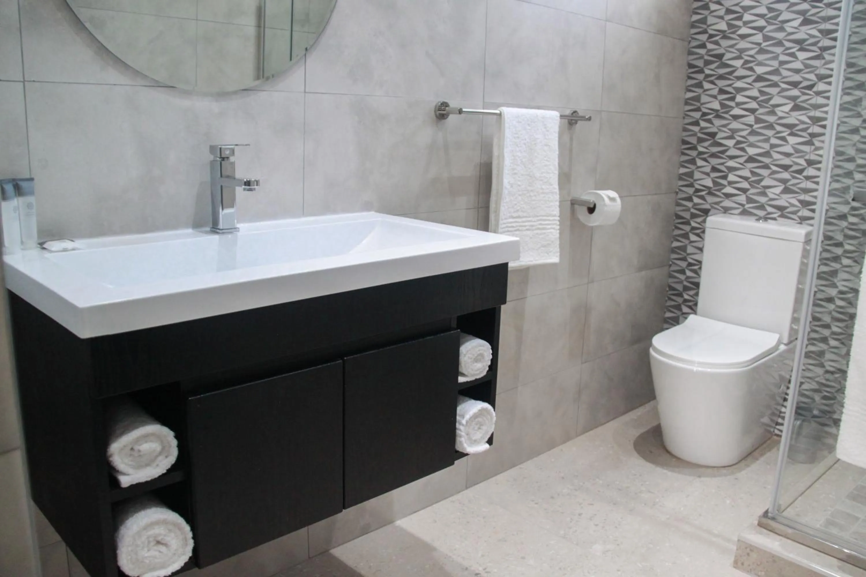 Bathroom in The Cato Suites Hotel