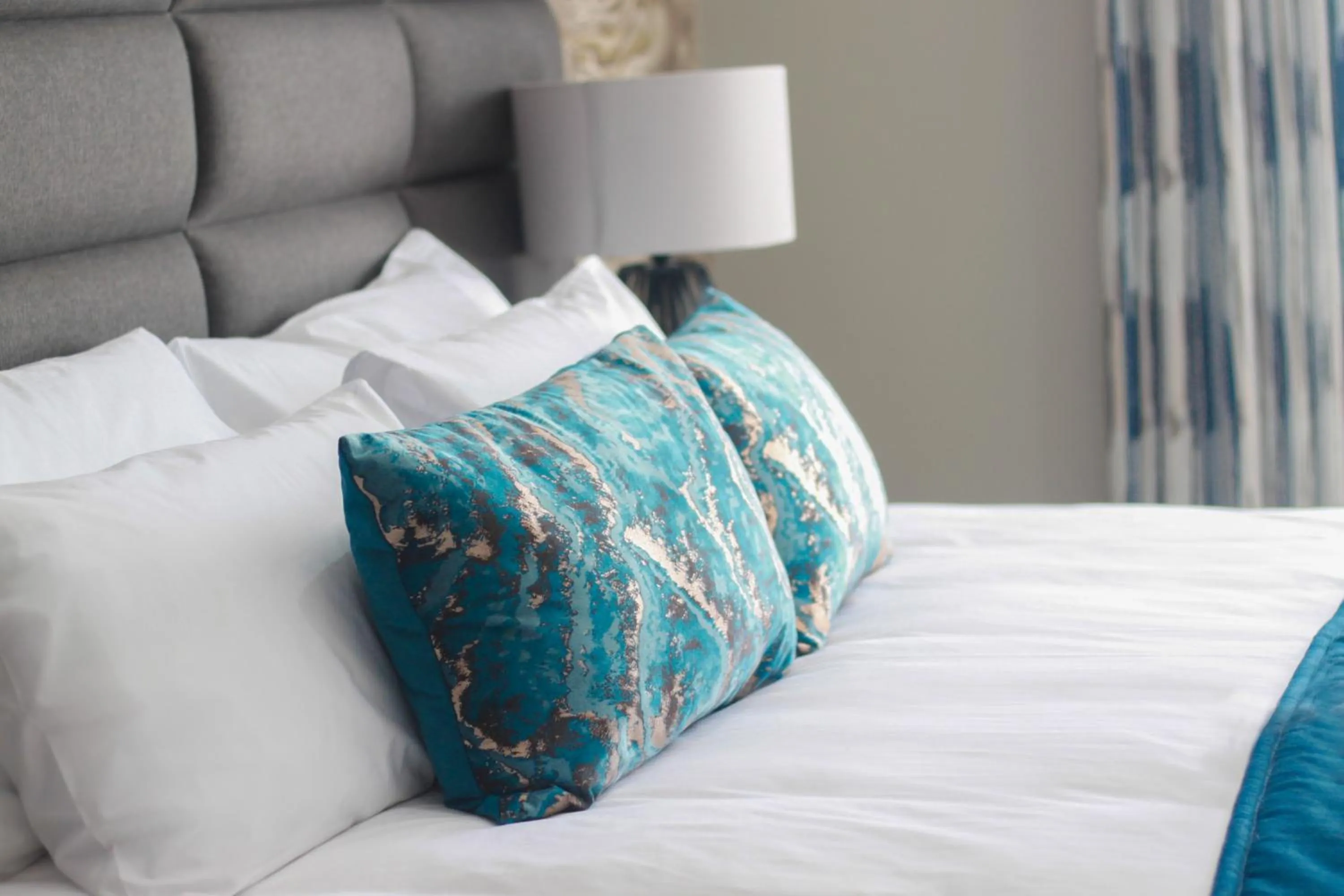 Bed in The Cato Suites Hotel