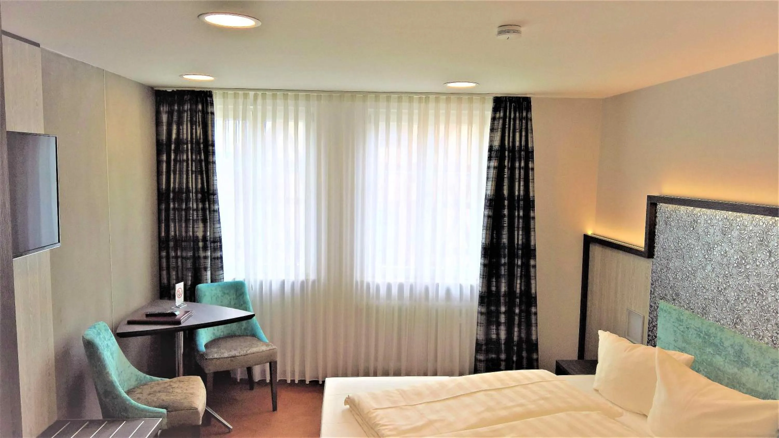Photo of the whole room, Bed in Hotel Sonne - Das kleine Altstadt Hotel