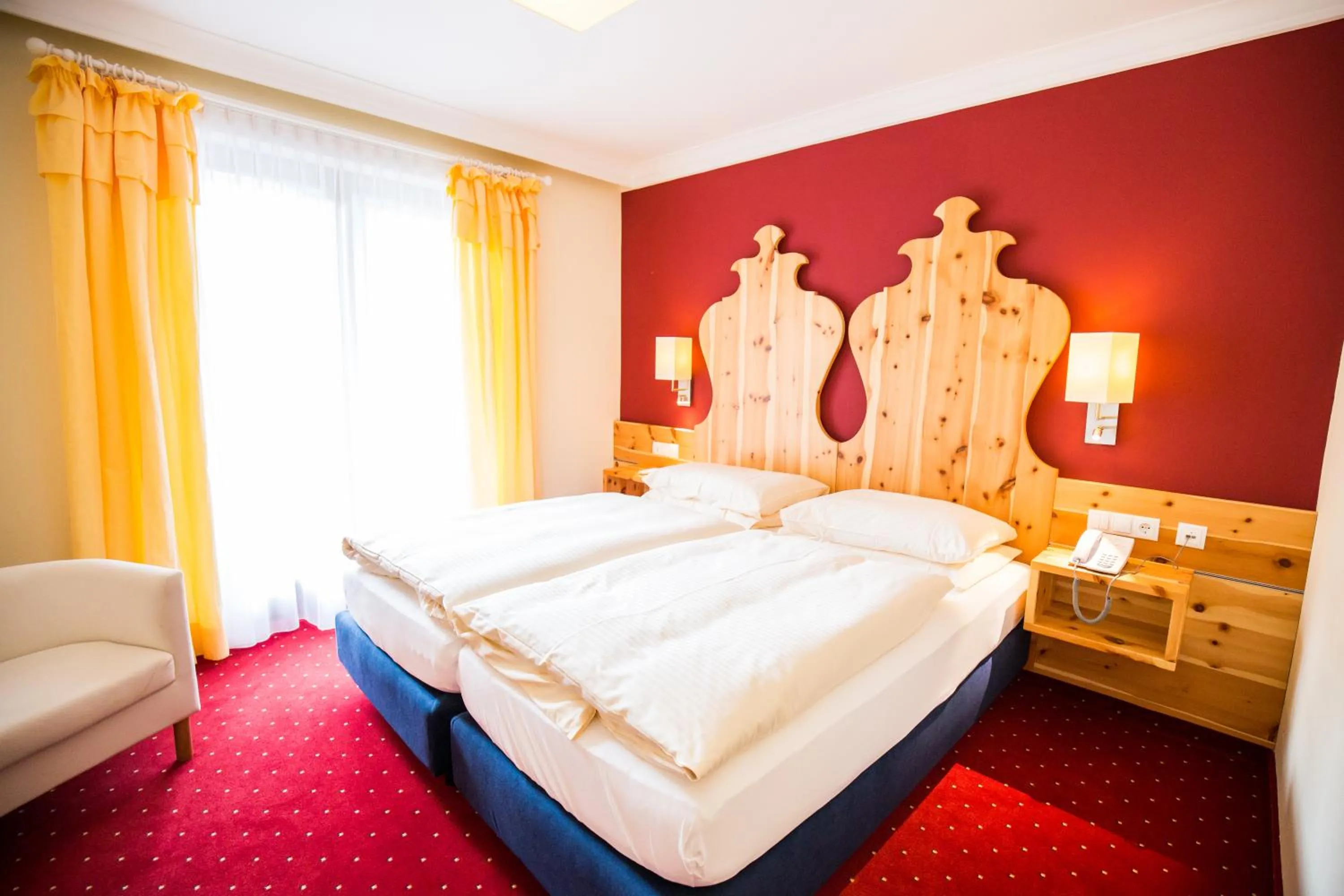 Bedroom, Bed in Hotel Enzian by Alpeffect Hotels