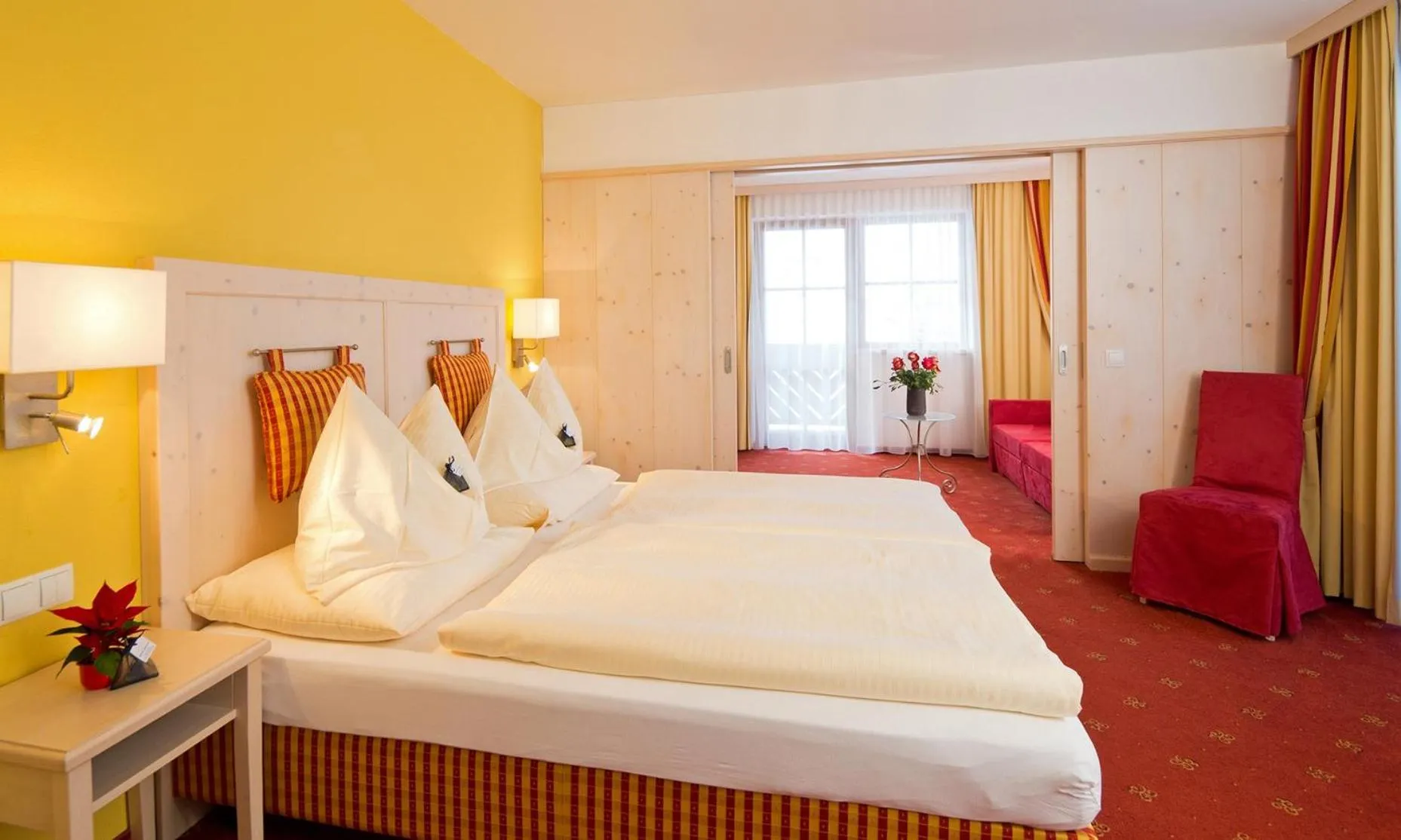 Bed in Hotel Enzian by Alpeffect Hotels