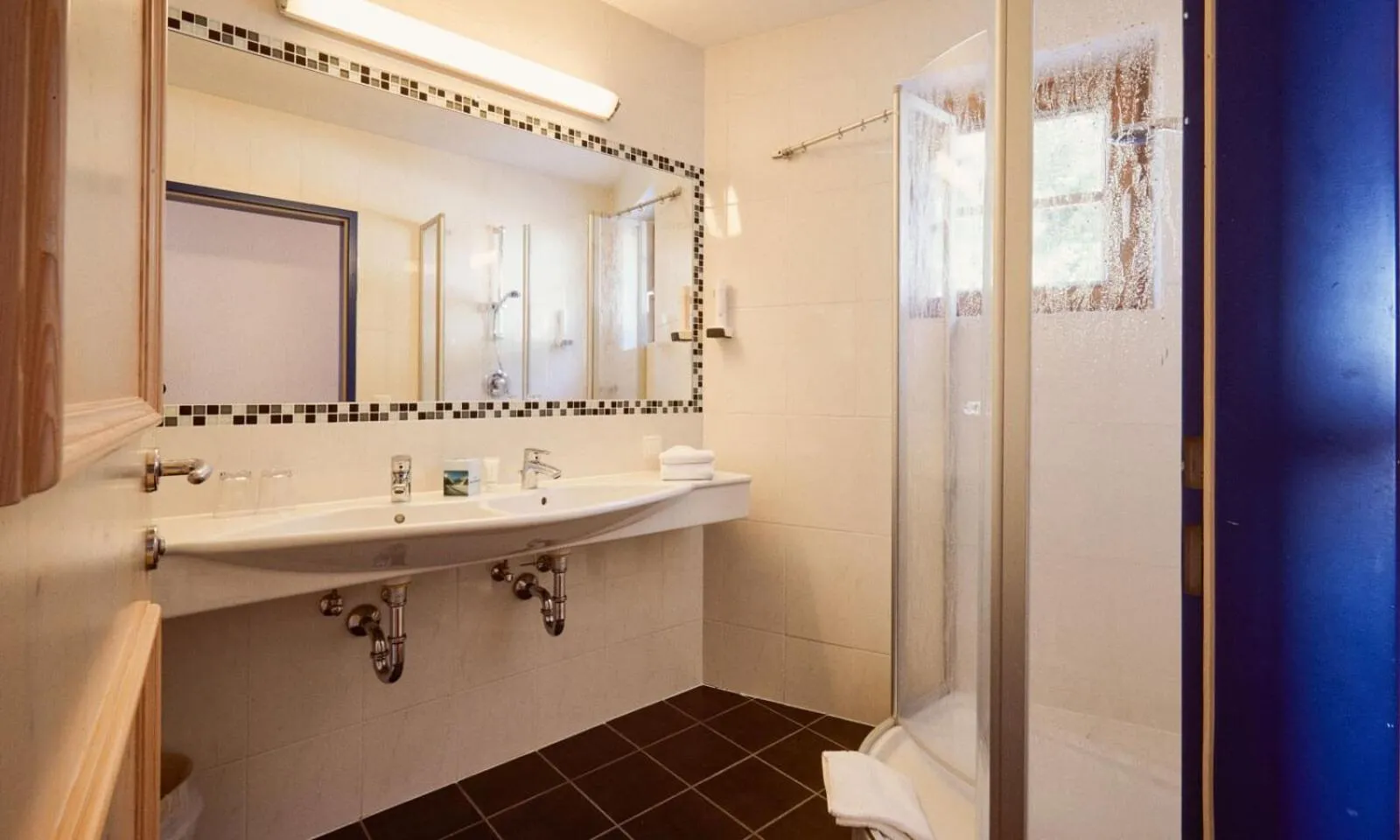 Shower in Hotel Enzian by Alpeffect Hotels