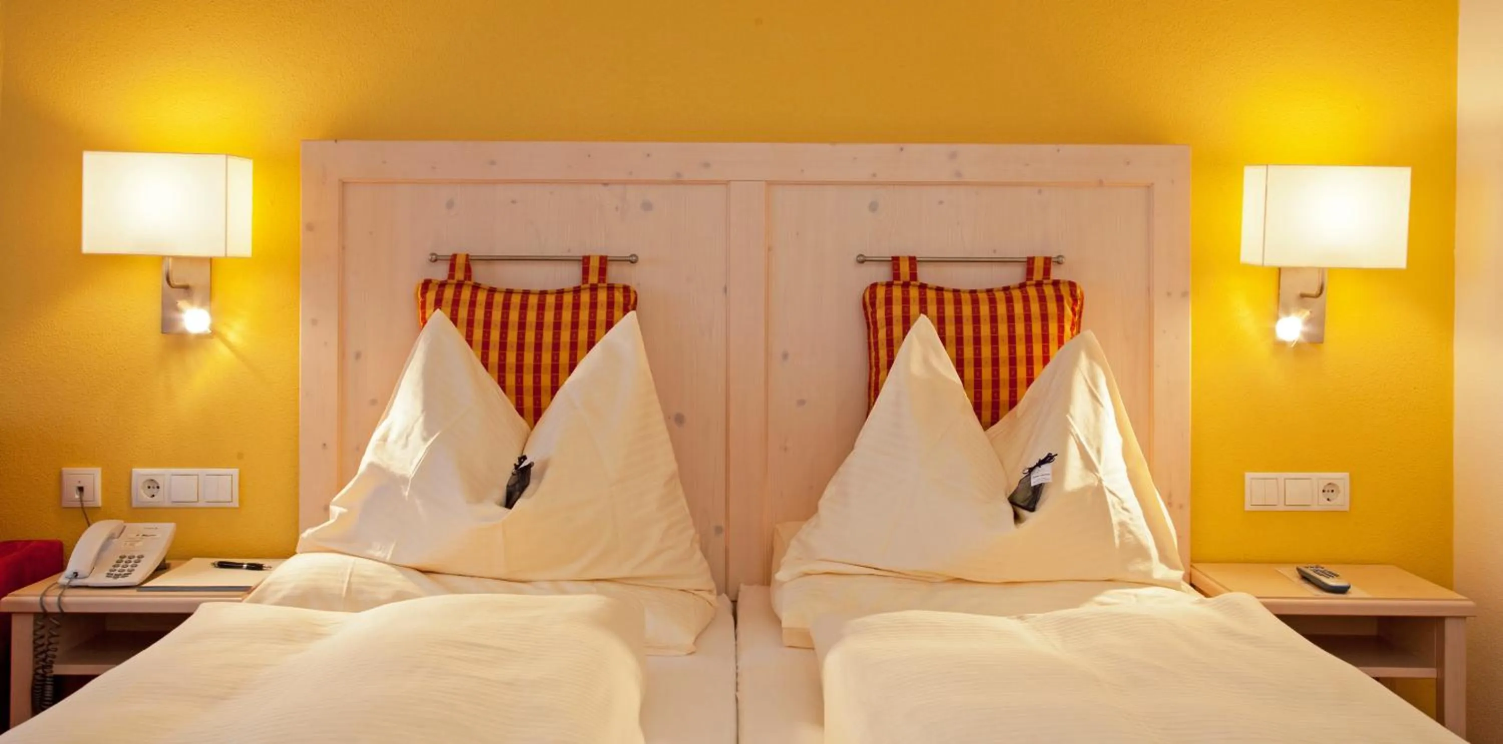 Bedroom, Bed in Hotel Enzian by Alpeffect Hotels