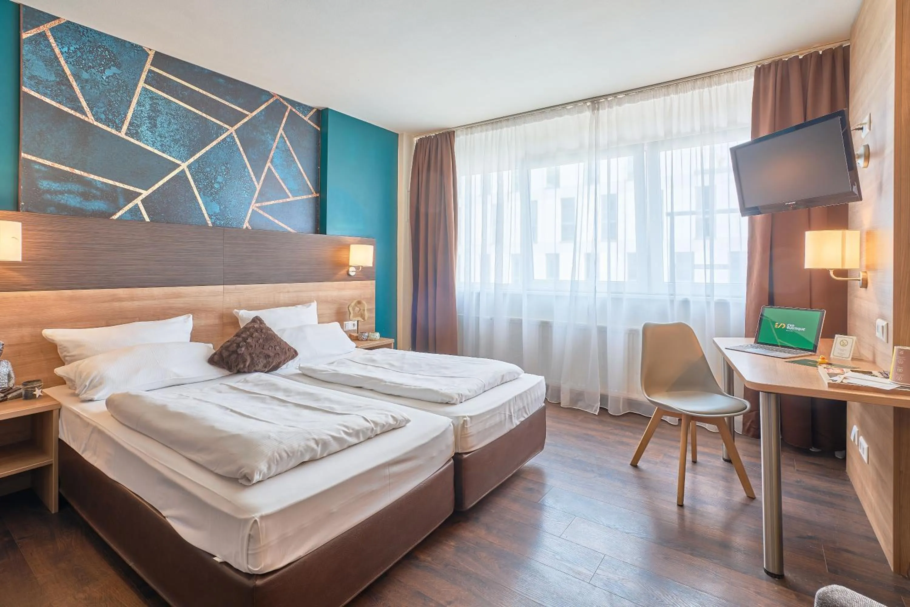 Photo of the whole room, Bed in eXo Boutique Hotel Mannheim - by SuperFly Hotels