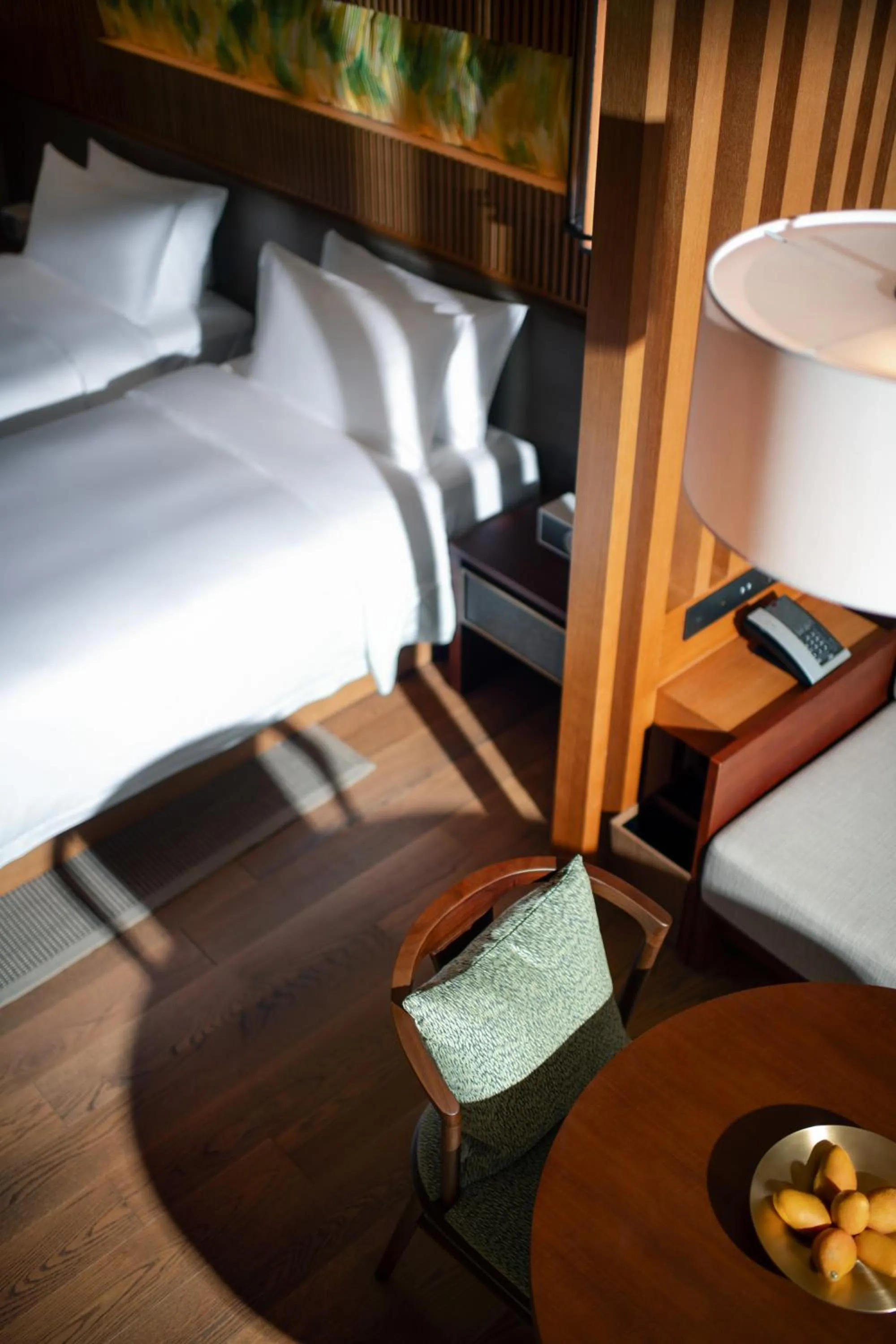 Bed in New World Qingyuan Hotel -formerly KHOS QINGYUAN