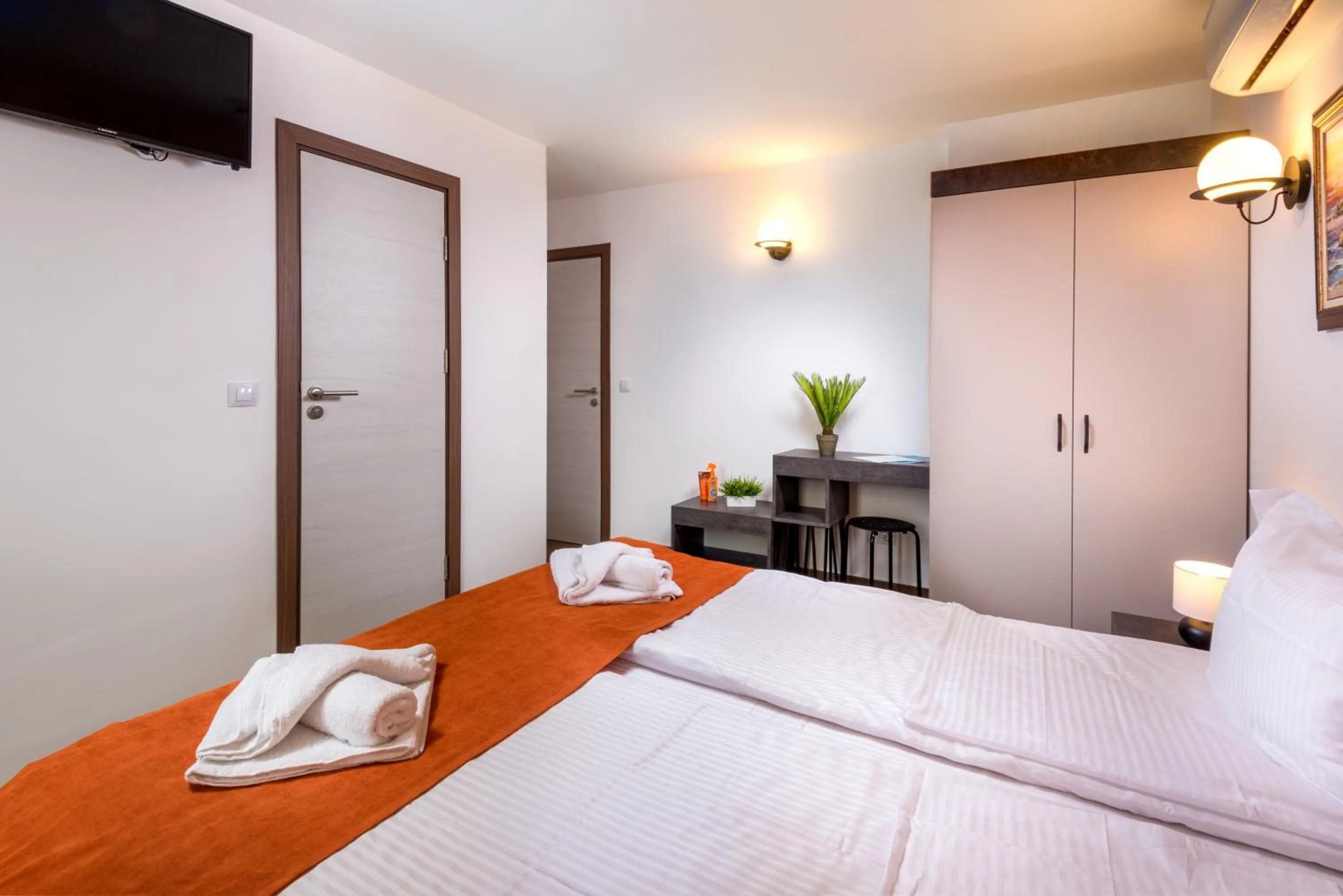 Bed in Panorama Blue Family Hotel and Free parking