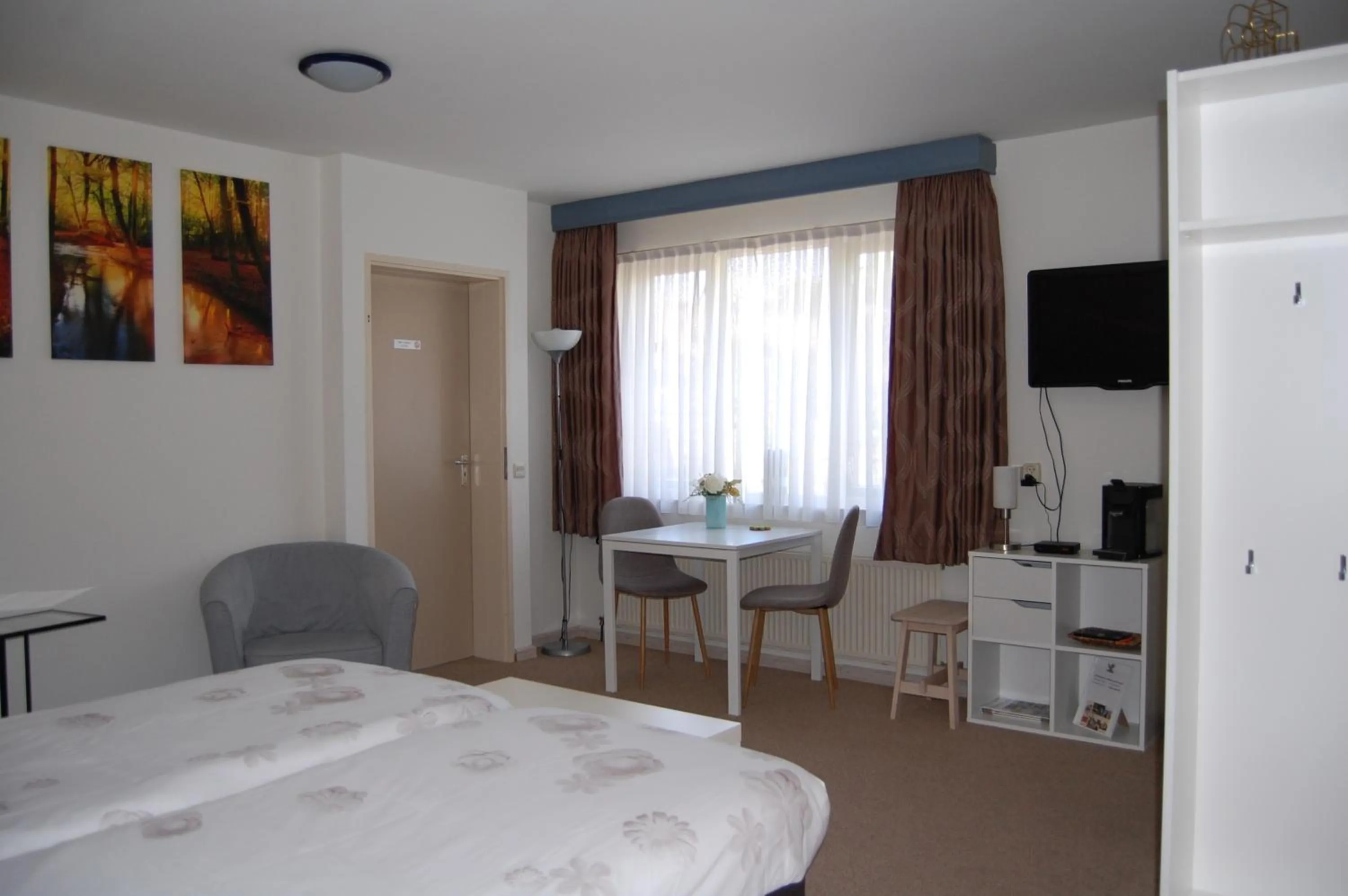 Seating area, Bed in B&B Gamerenwaard