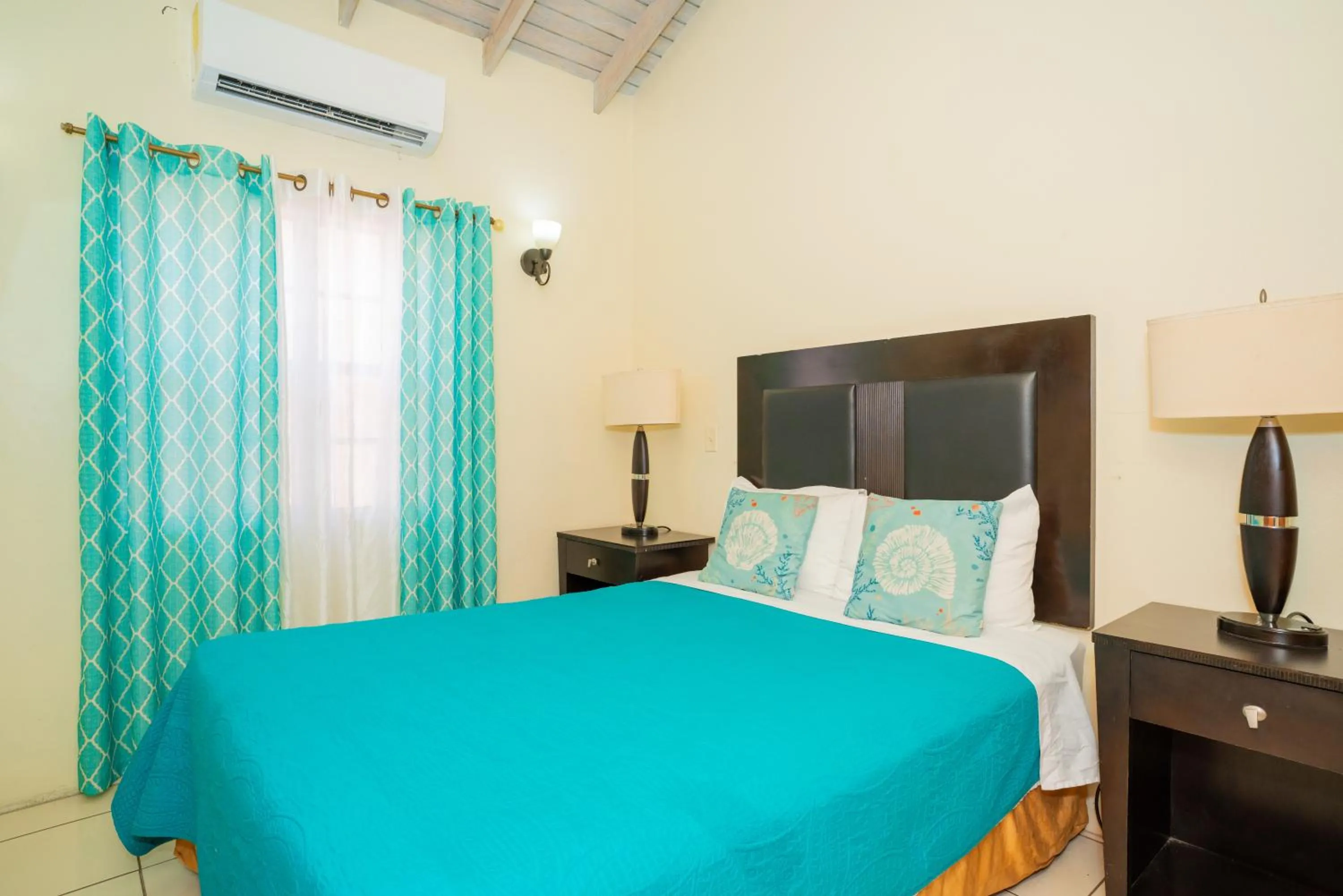 Bed in Connie's Comfort Suites