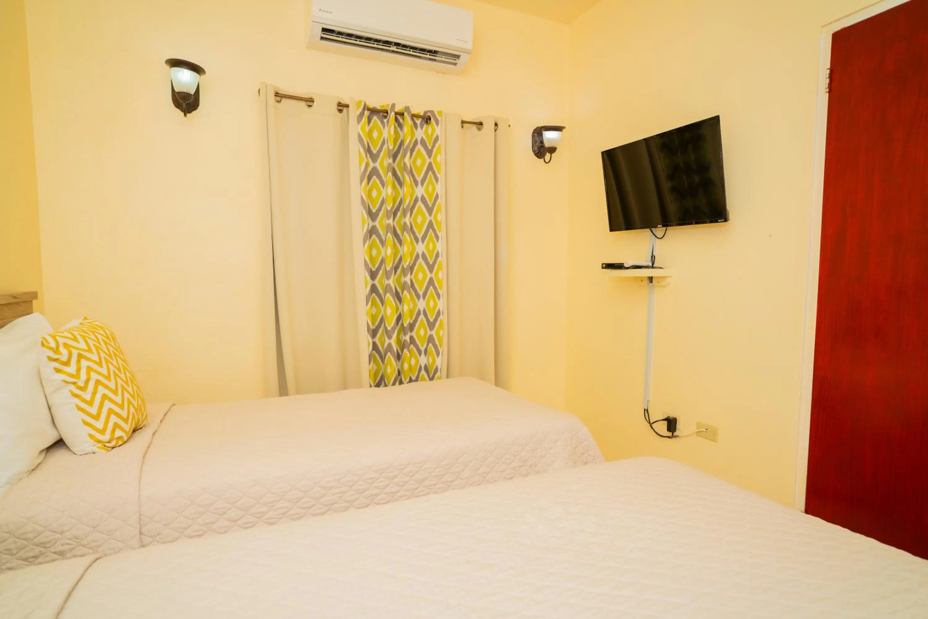 Bed in Connie's Comfort Suites