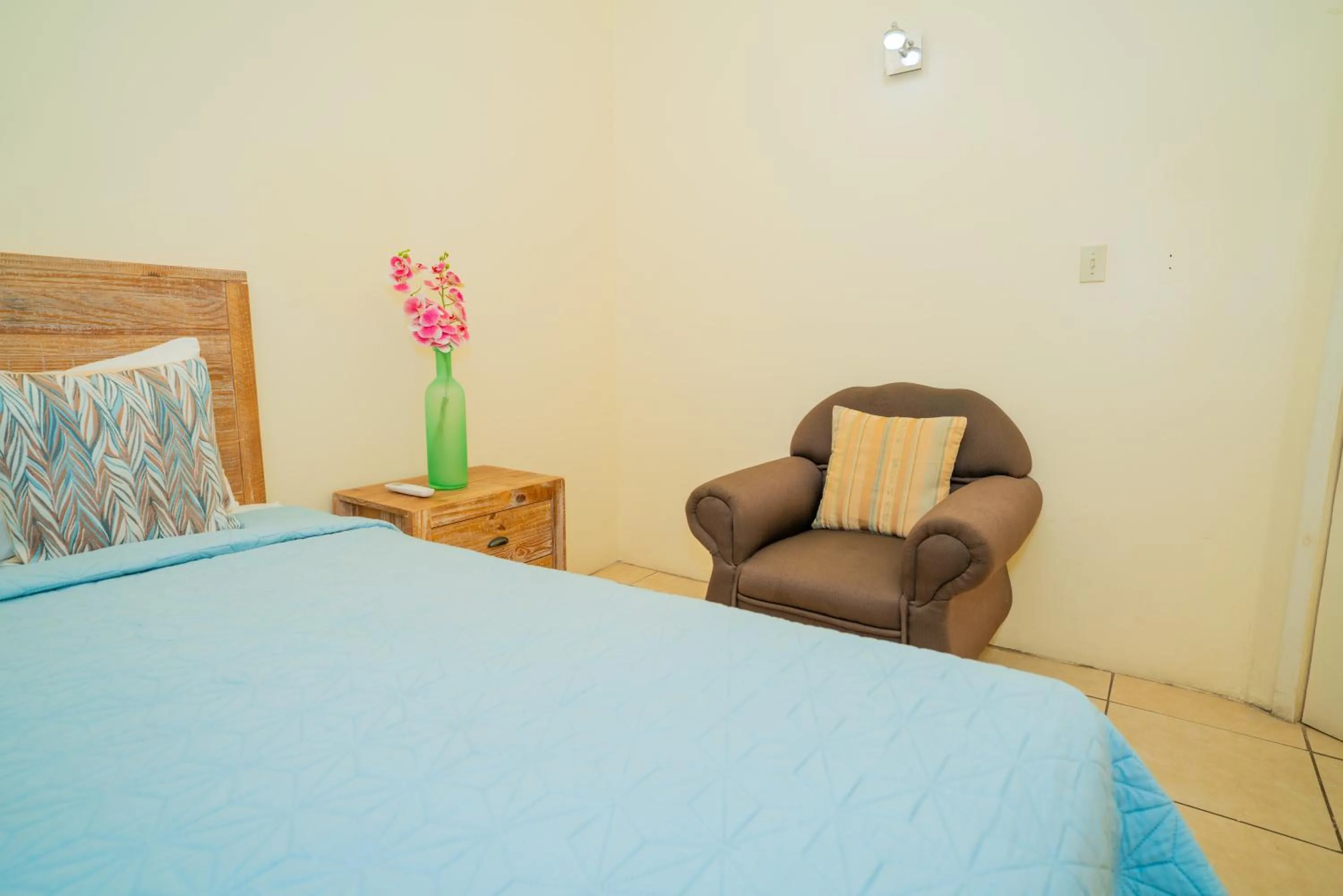 Bed in Connie's Comfort Suites