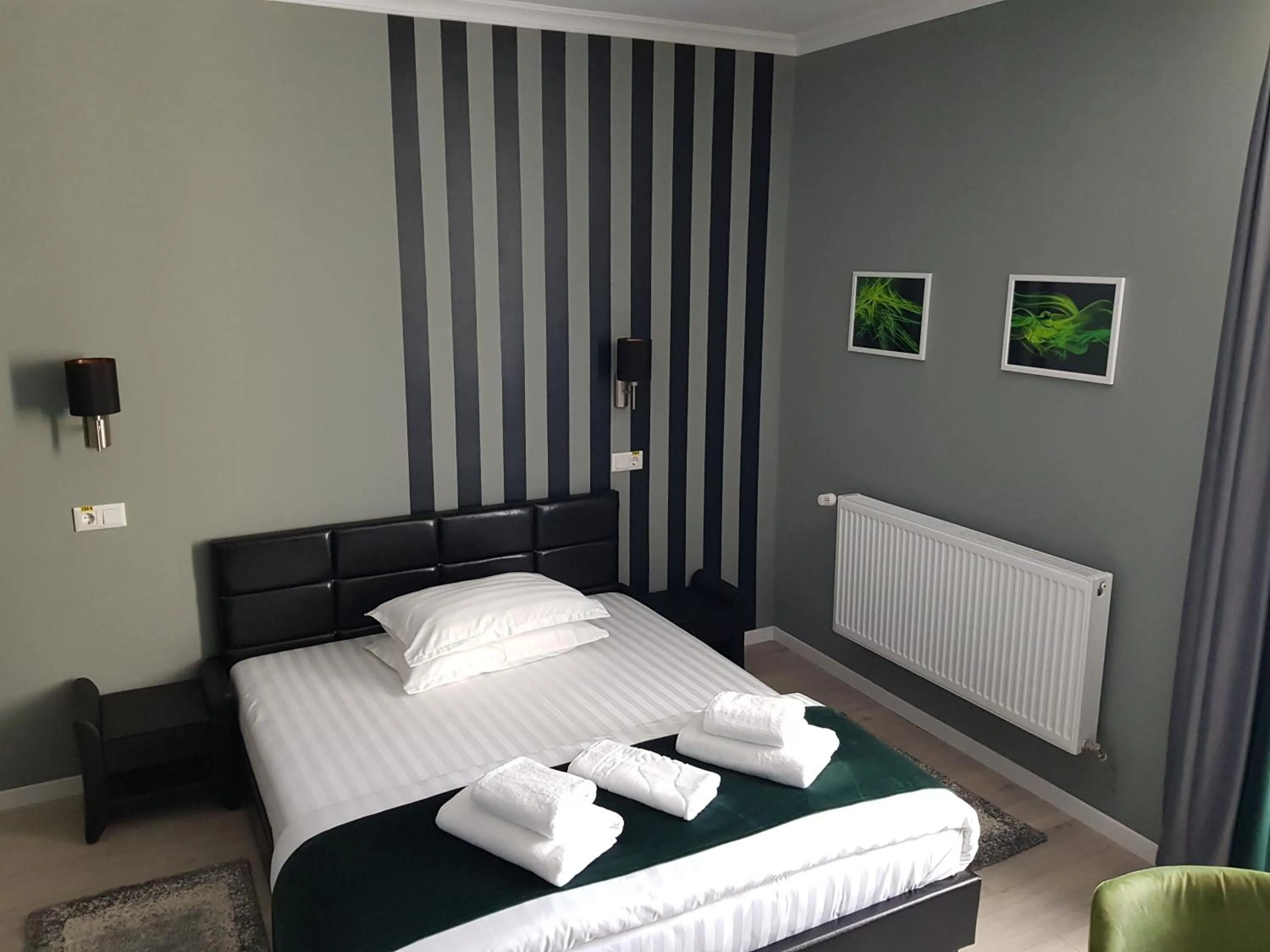 Bed in Resita Residence Hotel