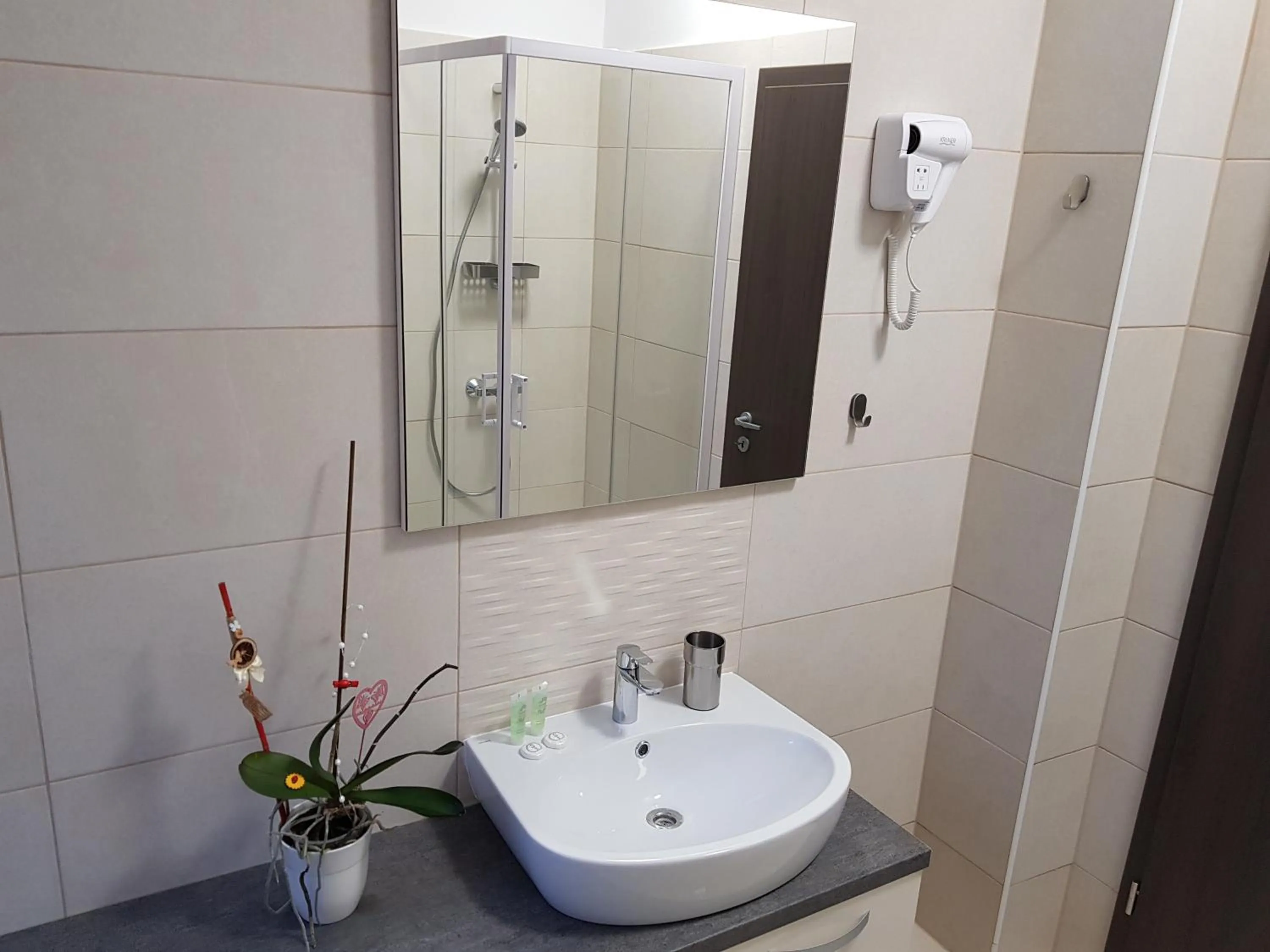 Bathroom in Resita Residence Hotel