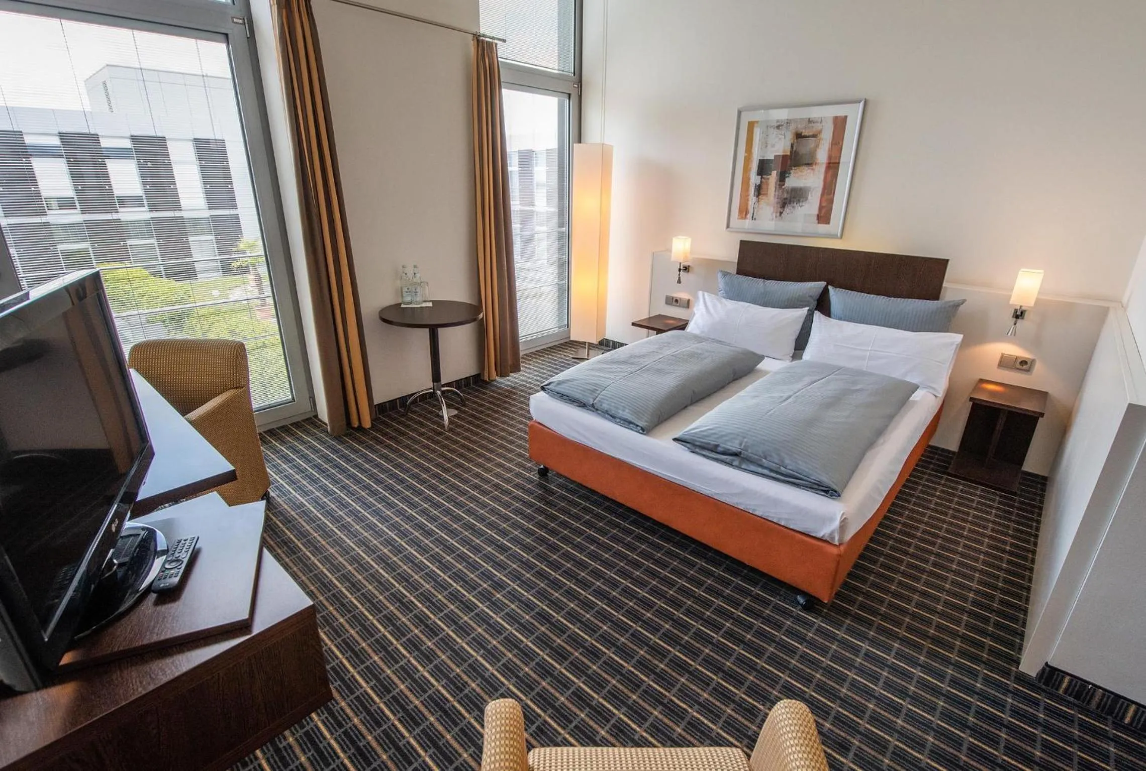 Photo of the whole room, Bed in Livenwork Hotel & CoWorking GVZ Ingolstadt