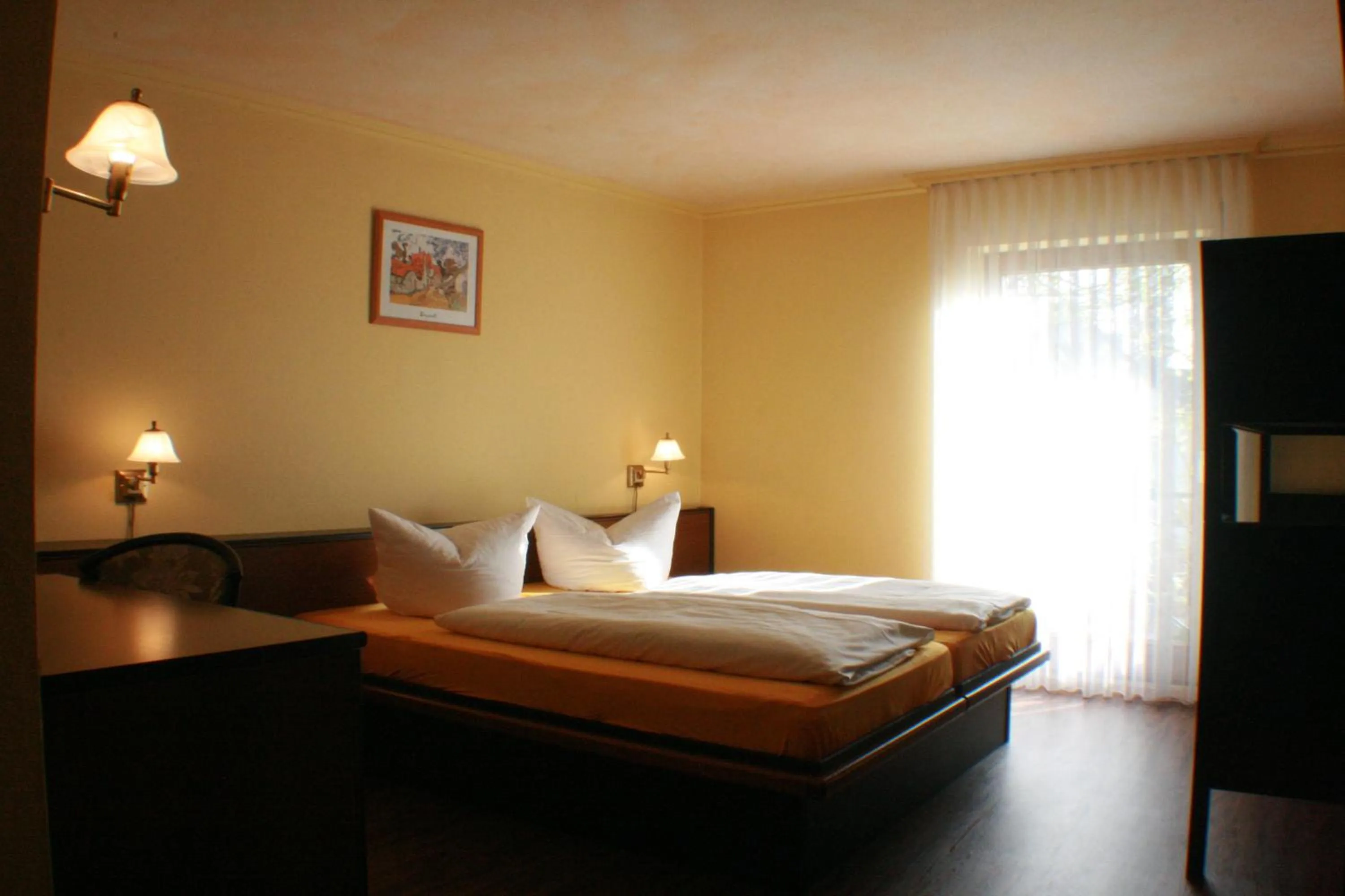 Bed in Hotel Rebstock