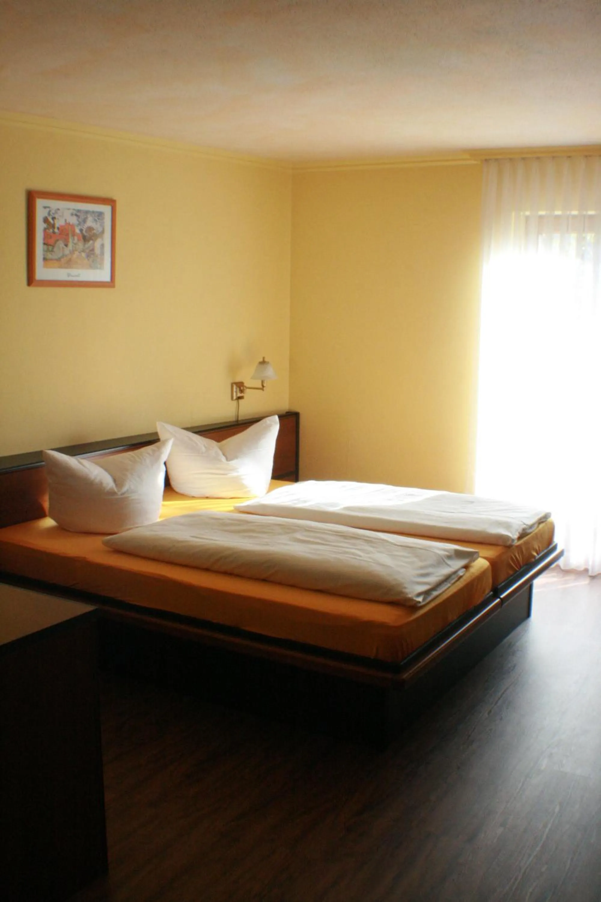 Bed in Hotel Rebstock