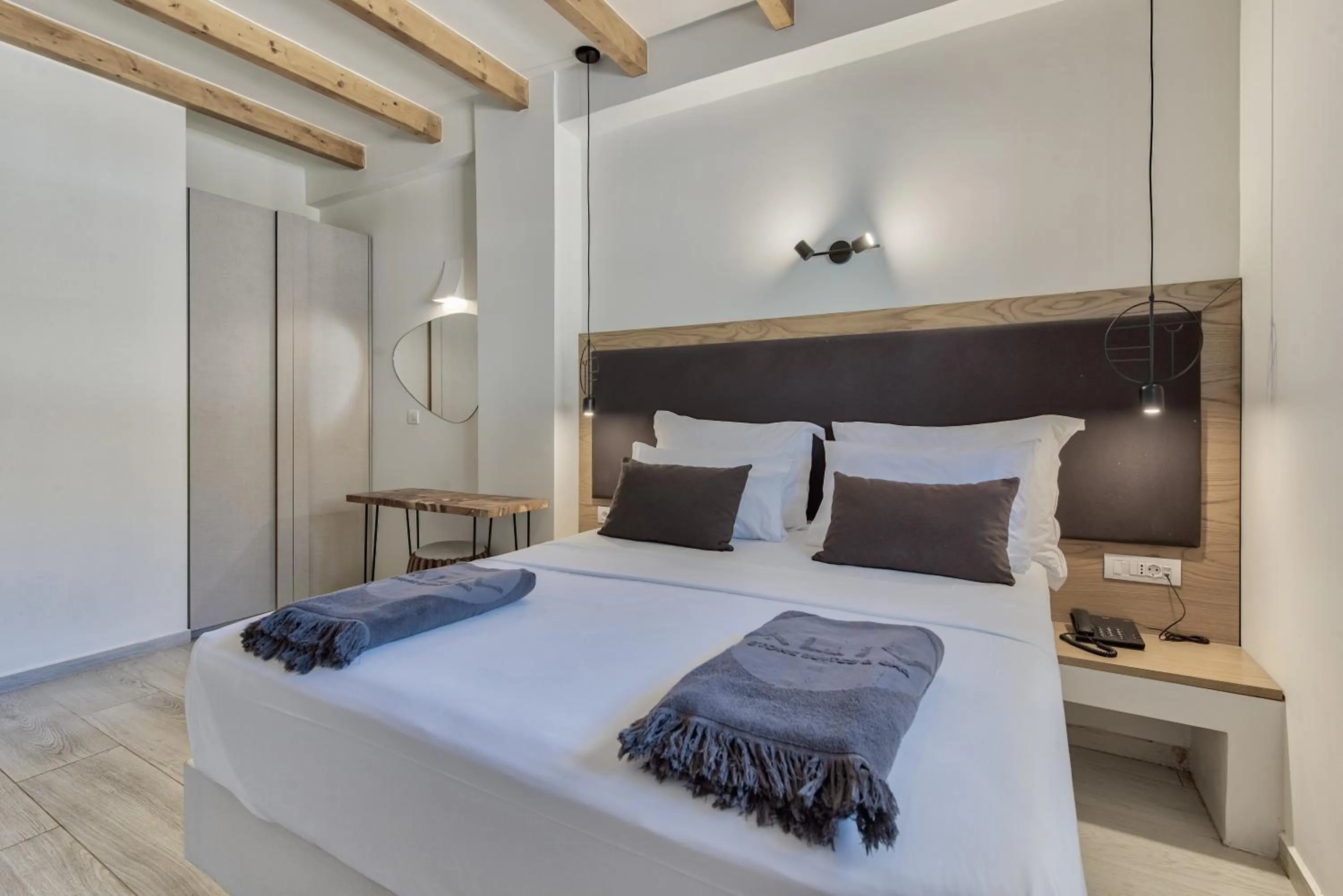 Bed in Aliv stone suites & spa