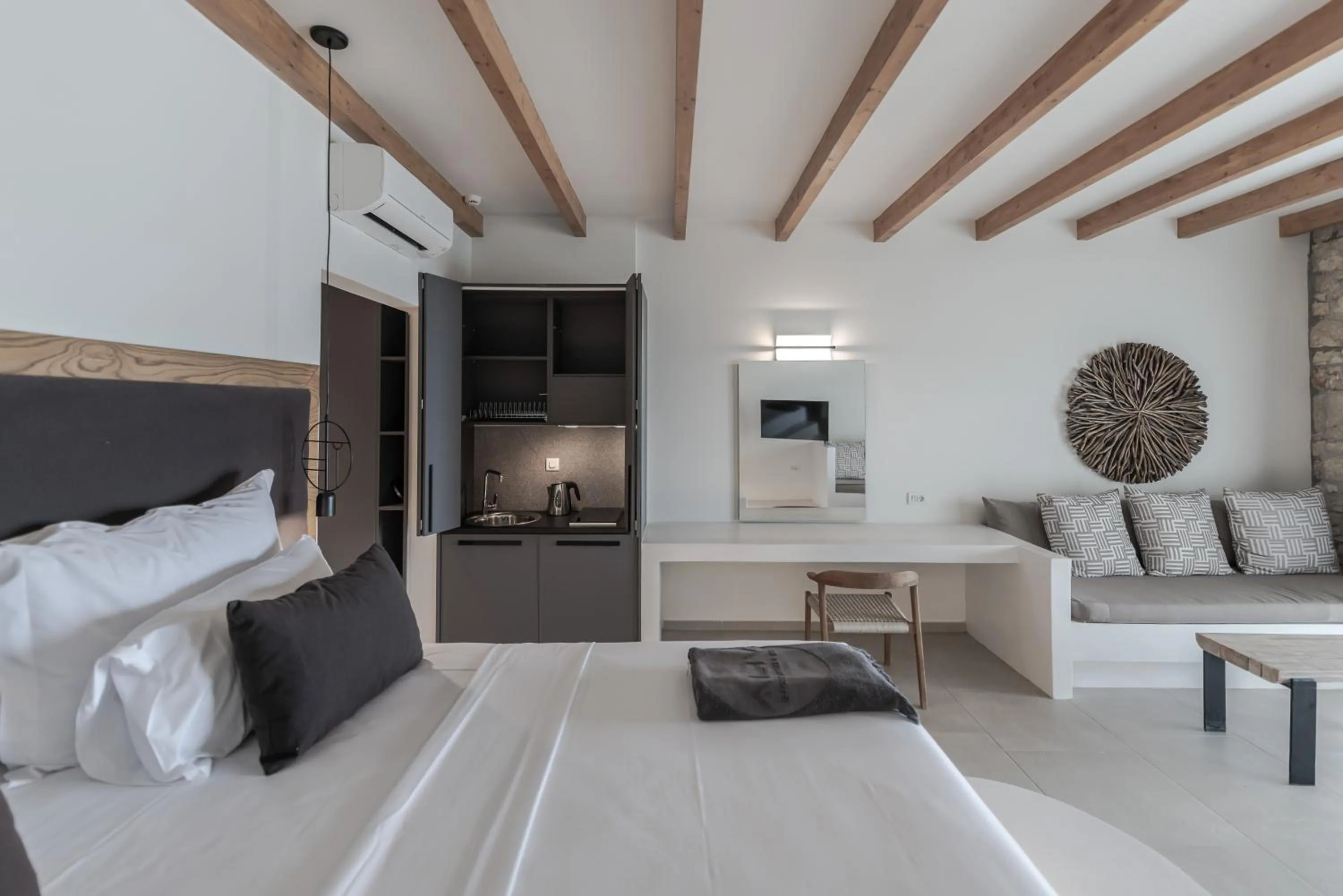 Bed in Aliv stone suites & spa