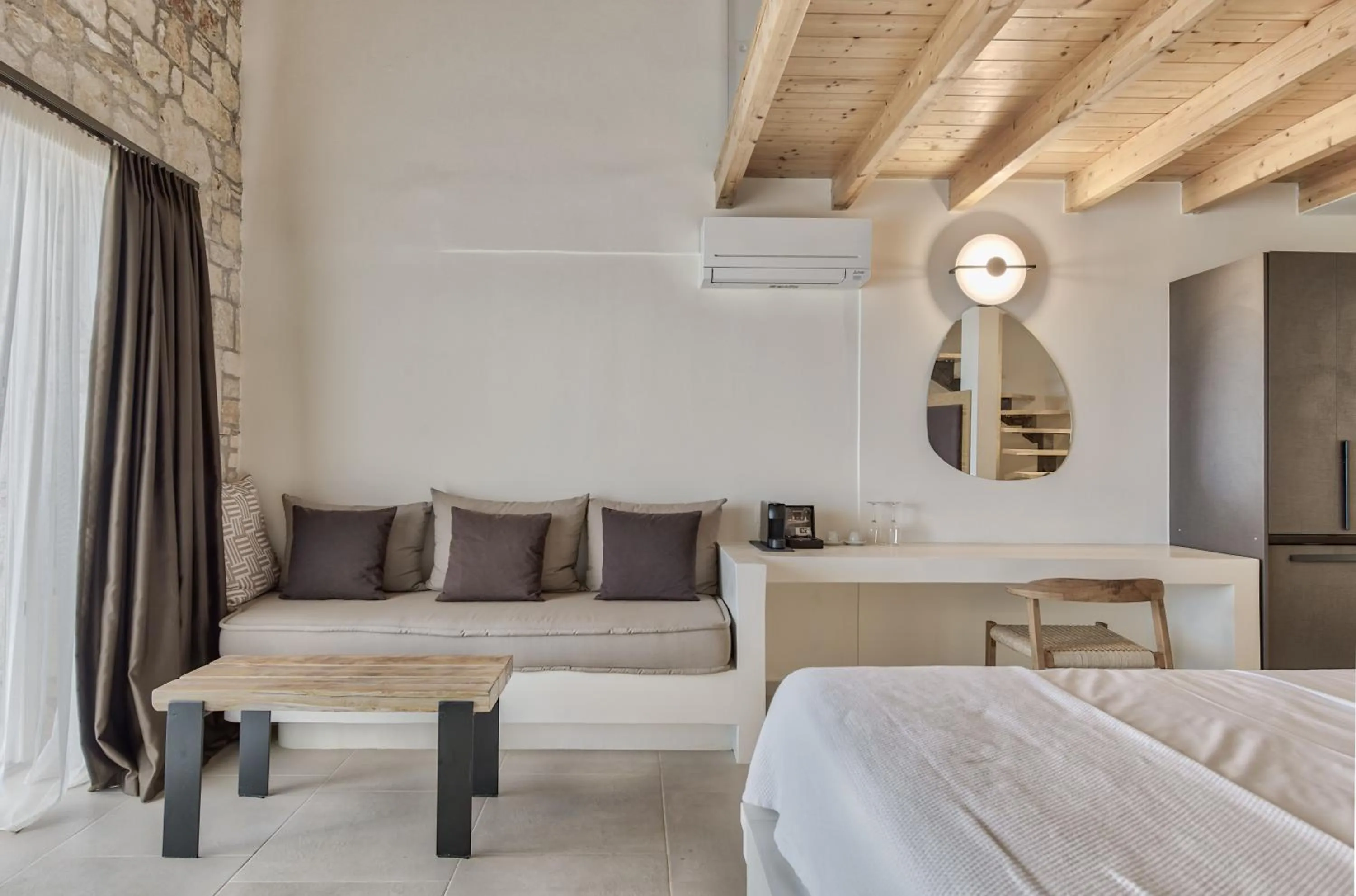 Bed in Aliv stone suites & spa