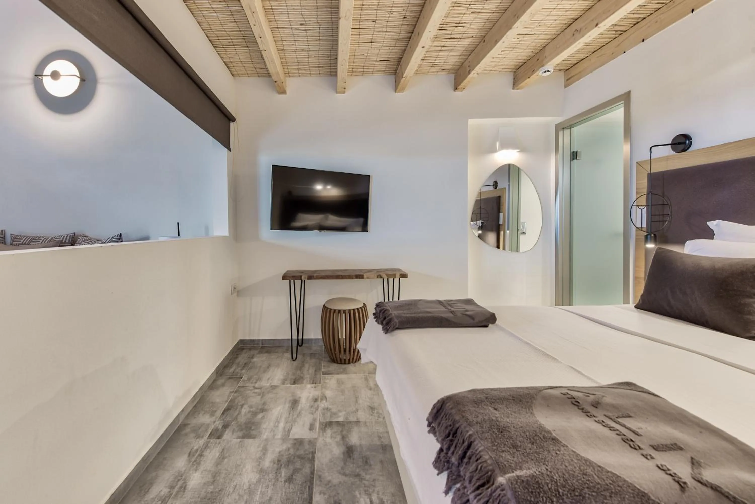 Bed in Aliv stone suites & spa