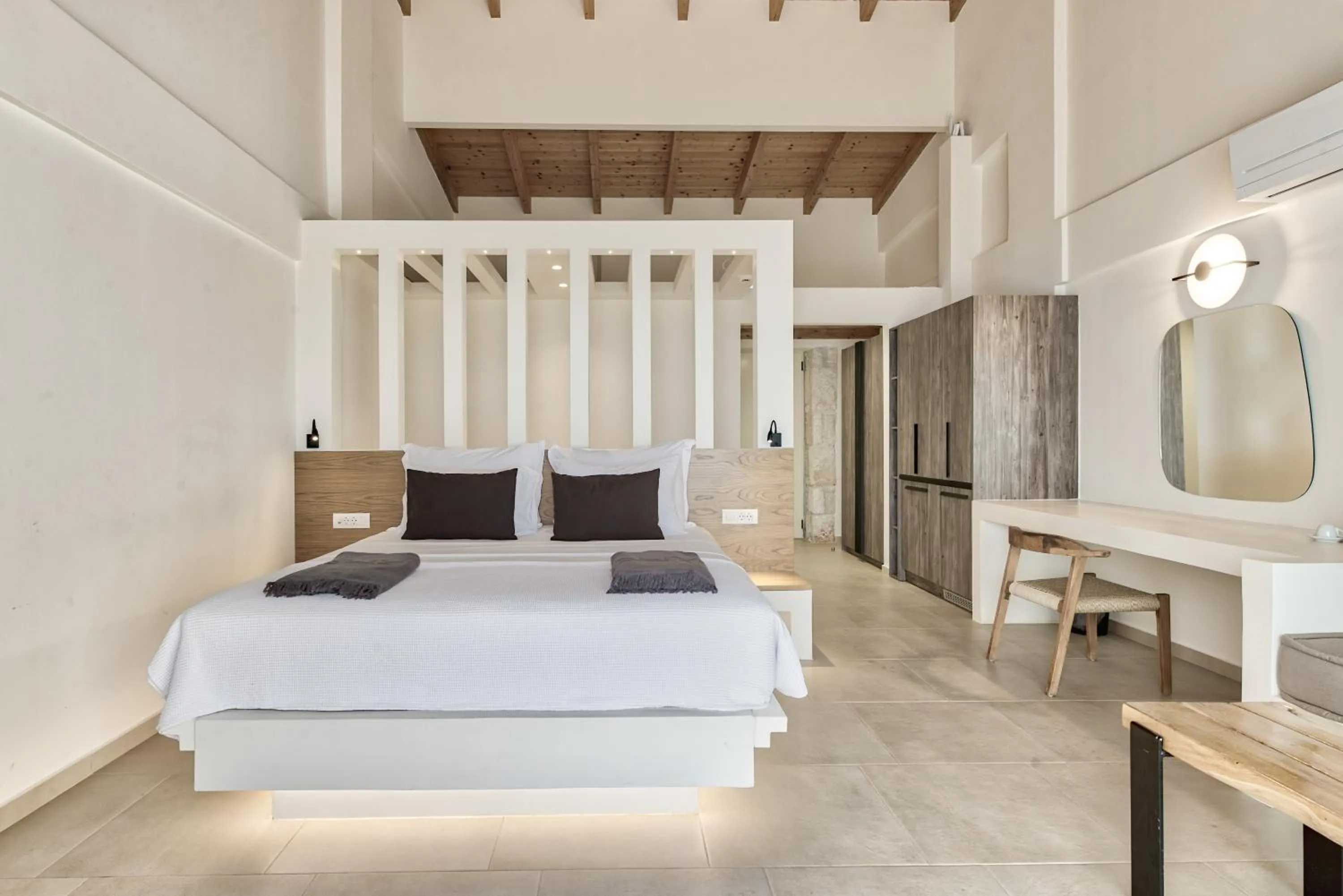 Bed in Aliv stone suites & spa