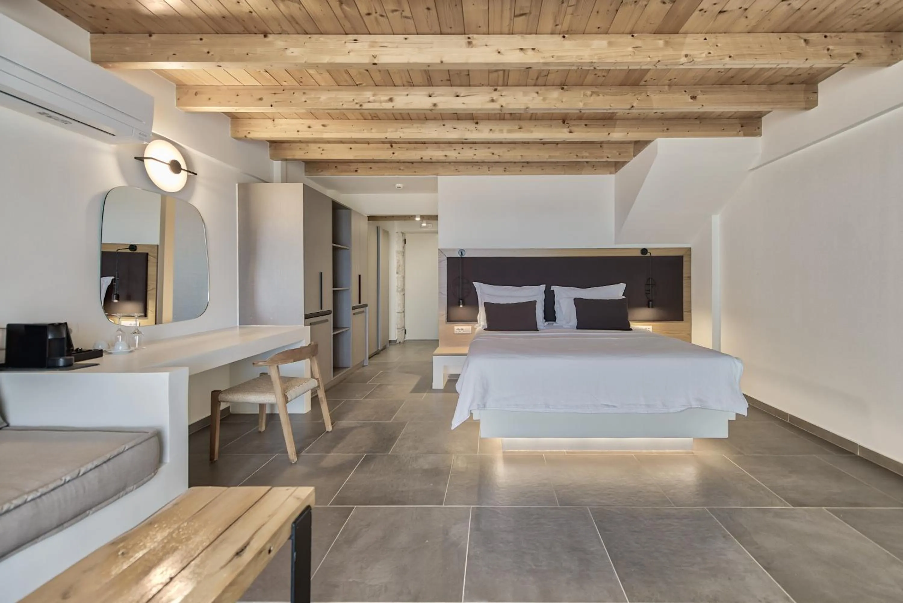 Bed in Aliv stone suites & spa