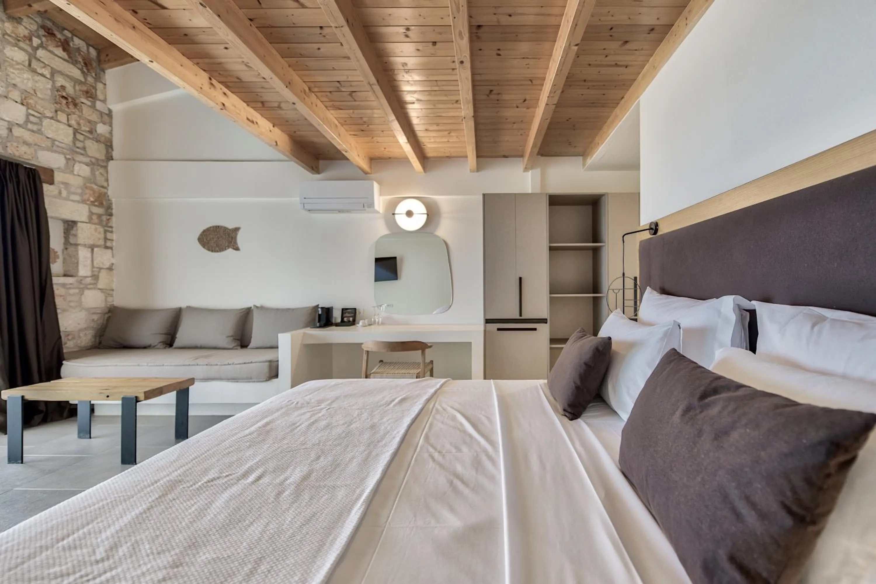 Bed in Aliv stone suites & spa