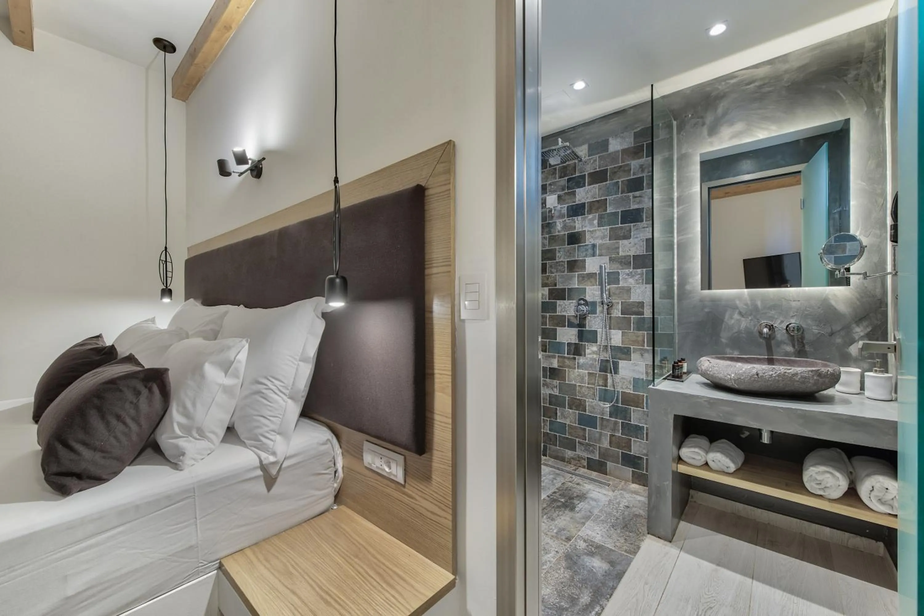 Bed in Aliv stone suites & spa