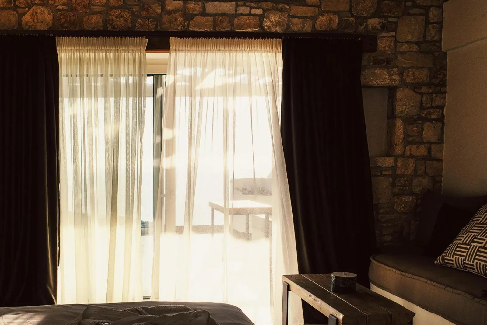 Decorative detail, Bed in Aliv stone suites & spa