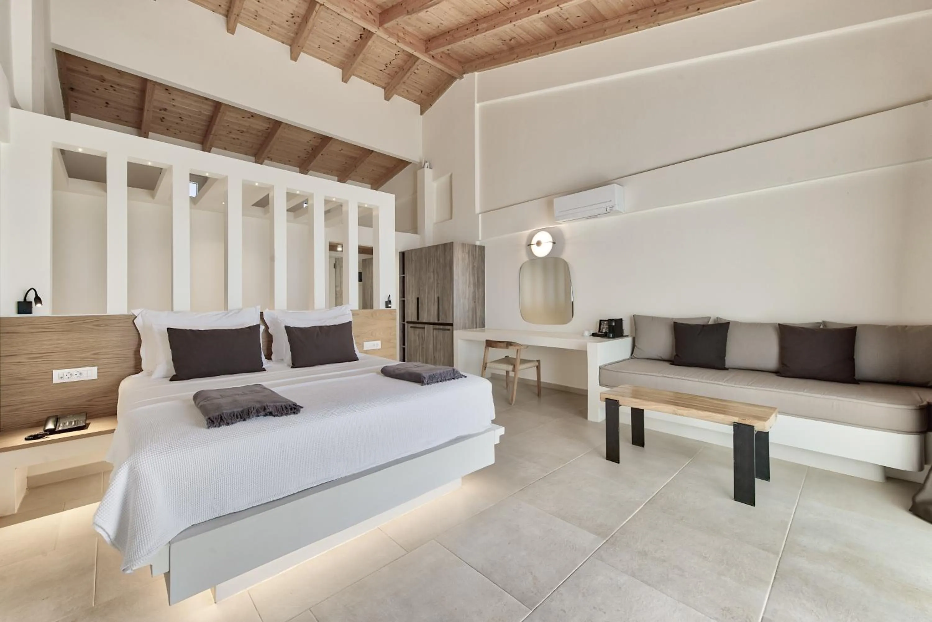 Bed in Aliv stone suites & spa