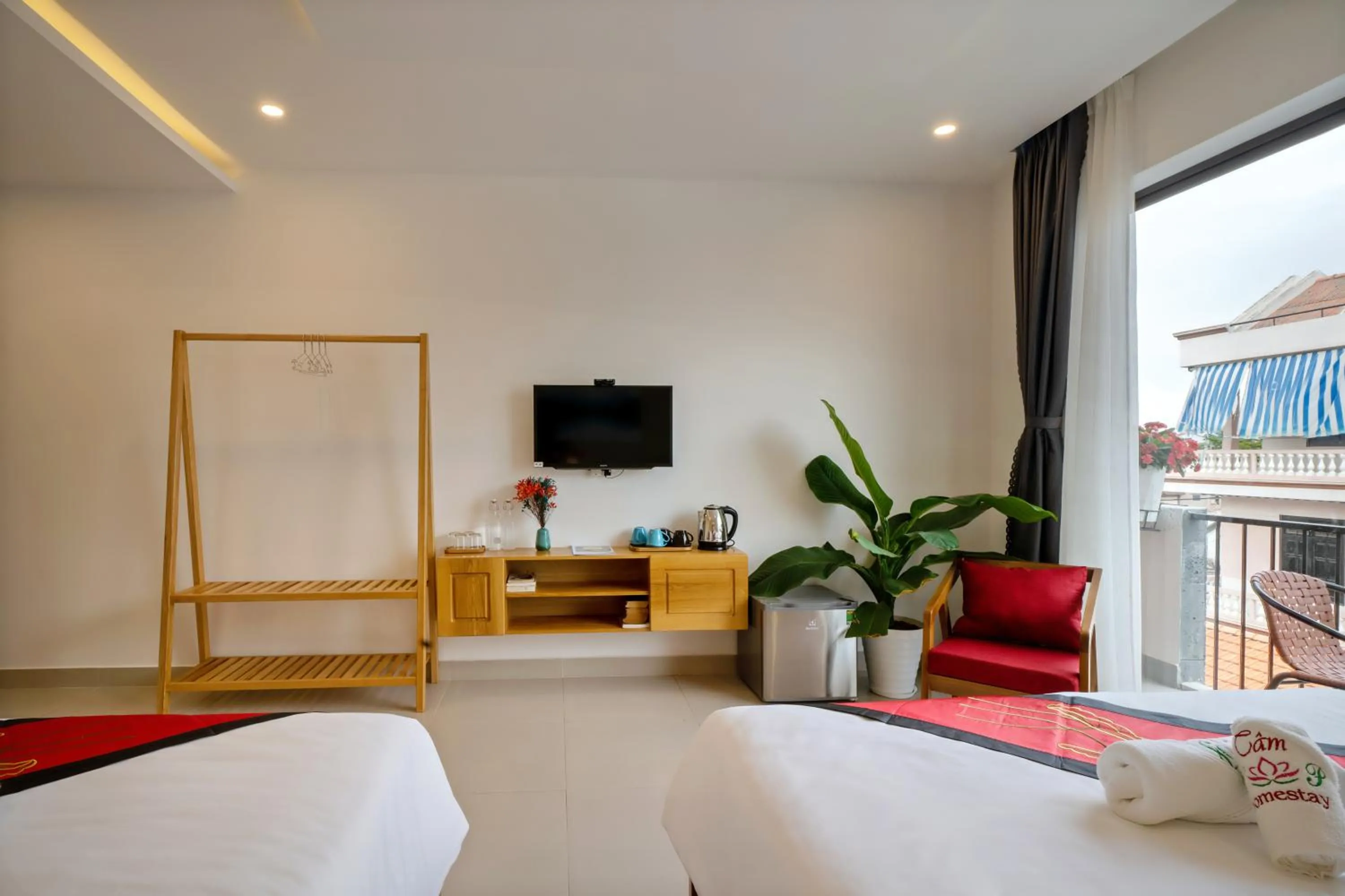 Communal lounge/ TV room, Bed in Tam Hong Phuc Homestay Hoi An