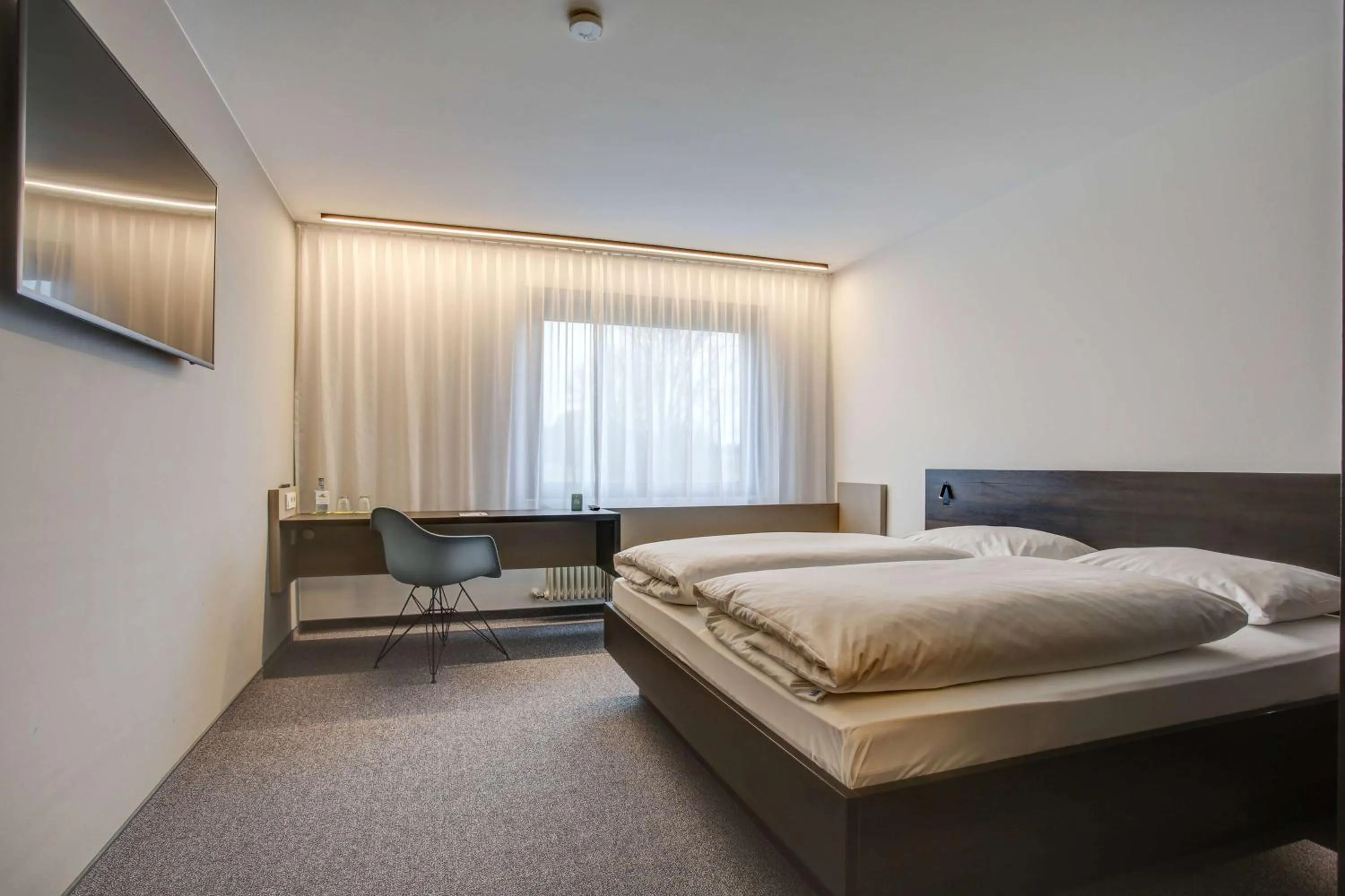 Photo of the whole room, Bed in Centro Park Hotel Stuttgart, Trademark Collection by Wyndham