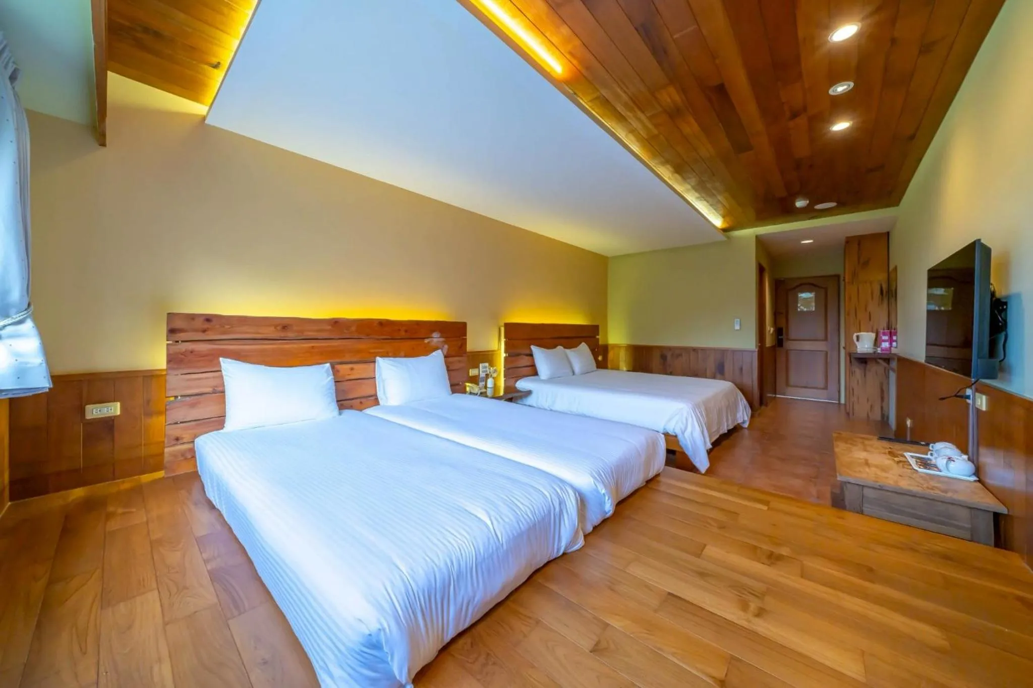 Bed in 檜木屋民宿