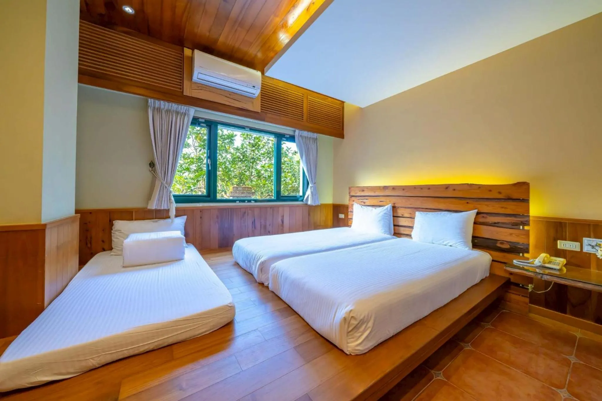 Bed in 檜木屋民宿