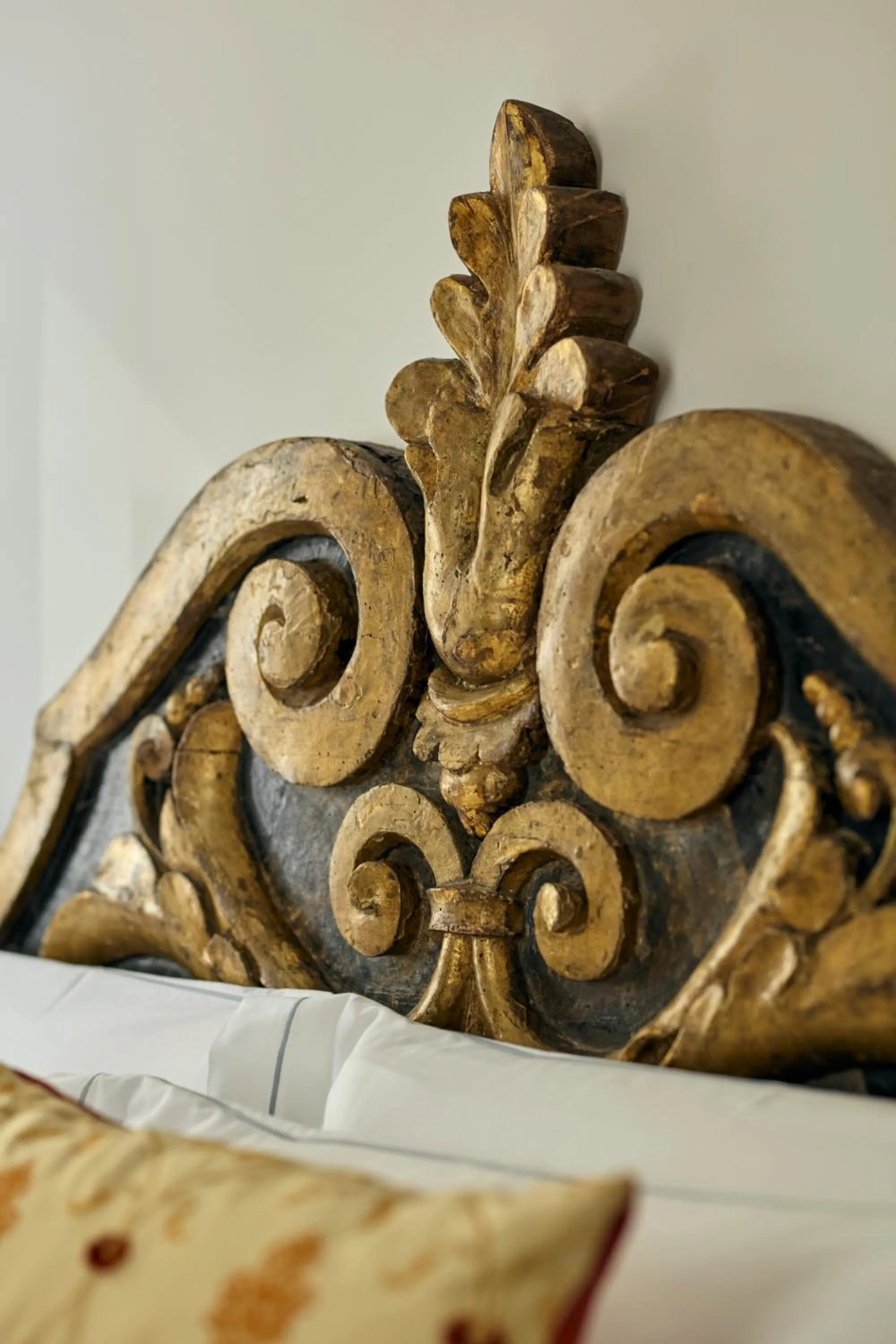 Decorative detail, Bed in Palazzo Delle Pietre - Luxury Apartments