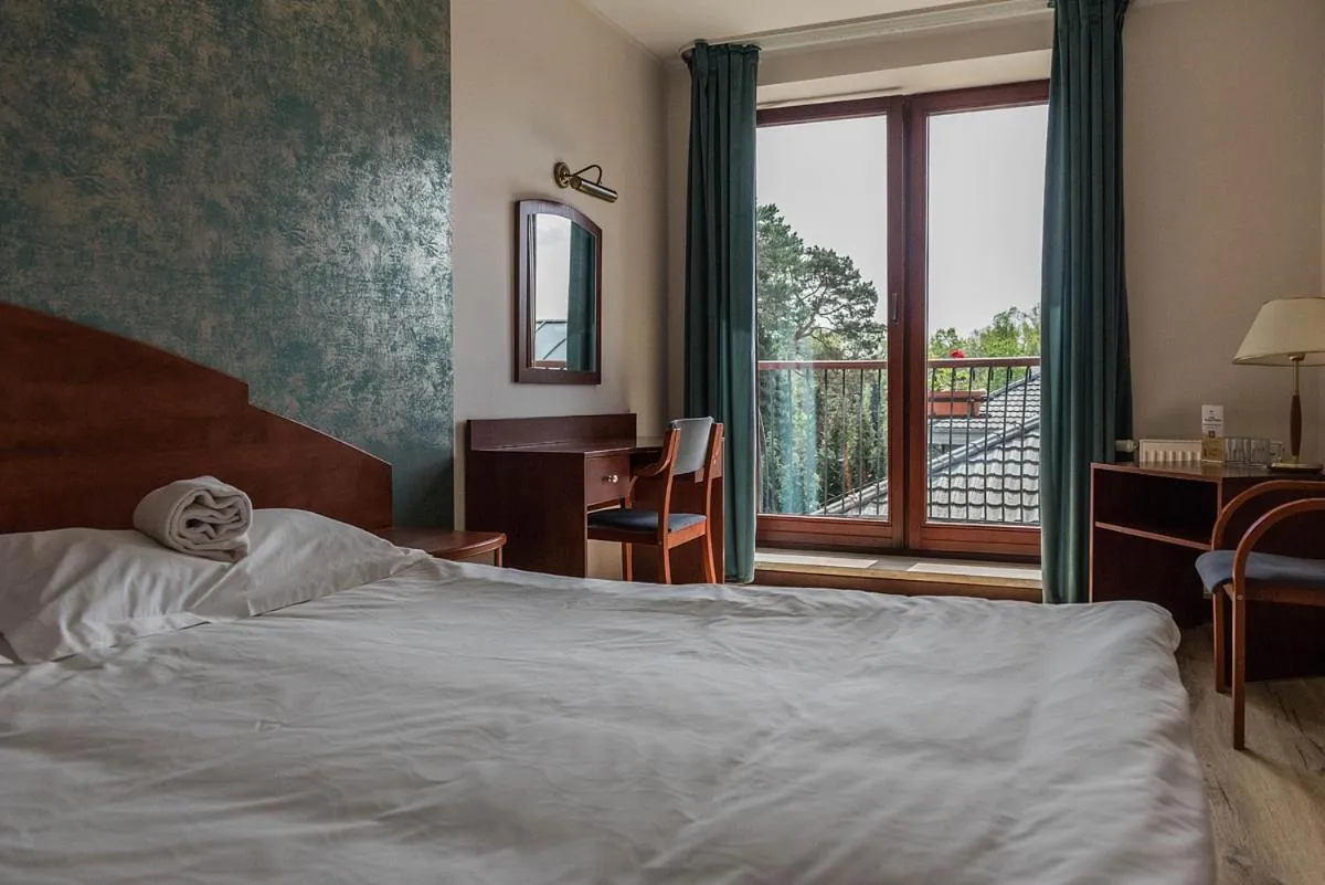 Bed in 4 Pory Roku Resort Sauna & Spa