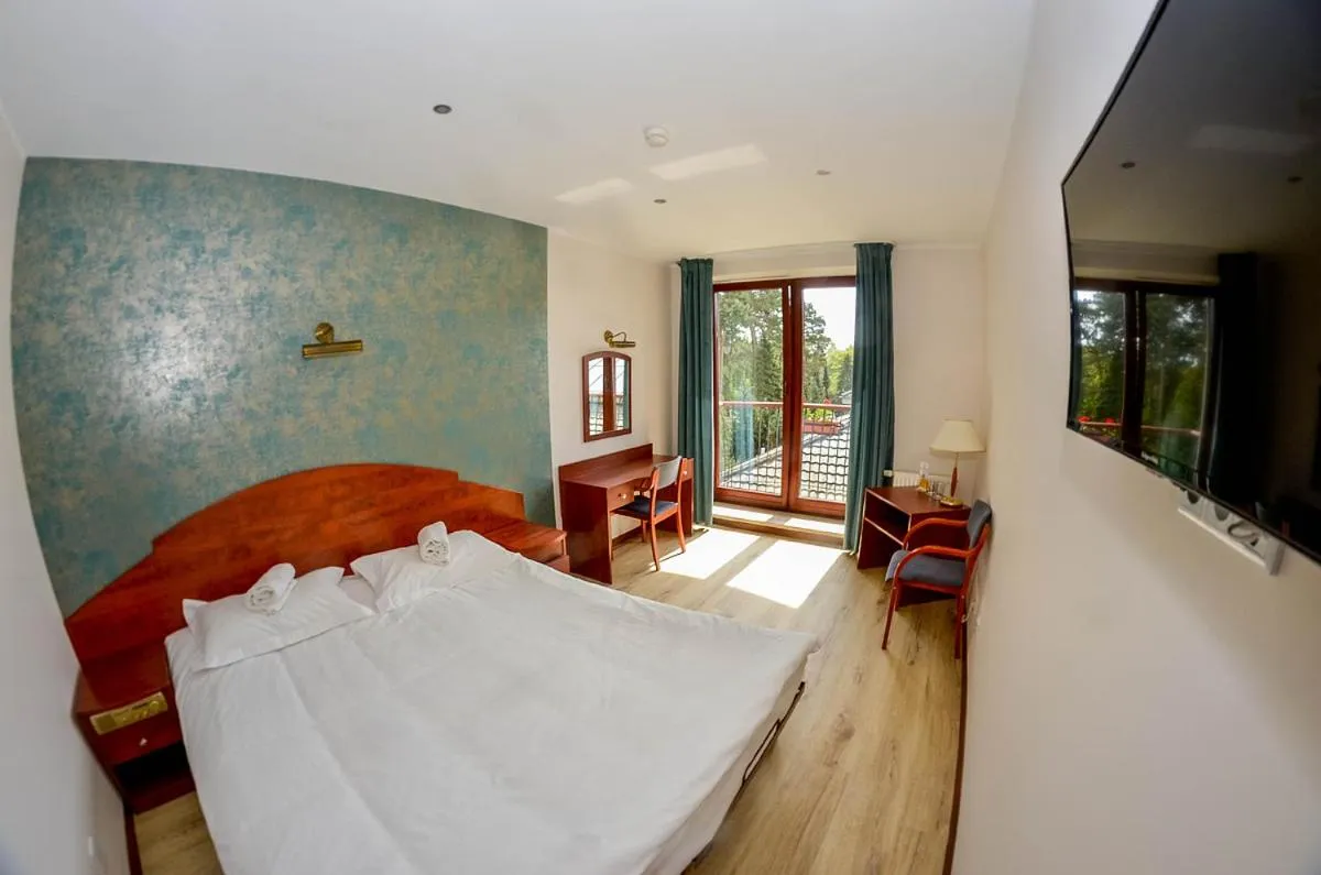 Bed in 4 Pory Roku Resort Sauna & Spa