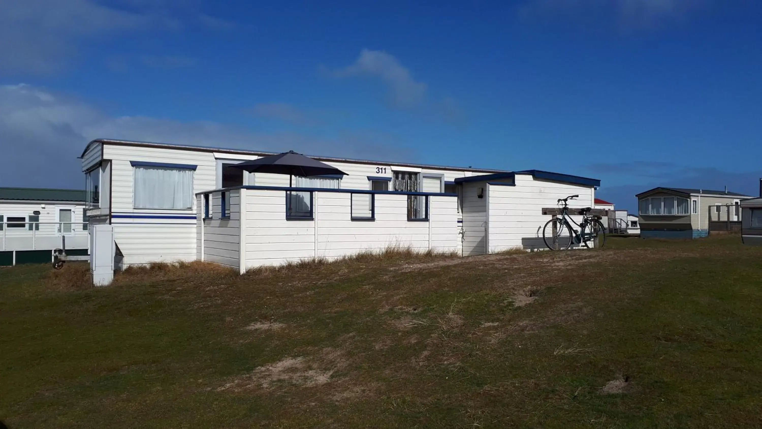 AMELAND - Ballum: Stacaravan Chalet (incl. fietsen) bij strand en zee AMELAND - Ballum: Stacaravan Chalet (incl. fietsen) bij strand en zee