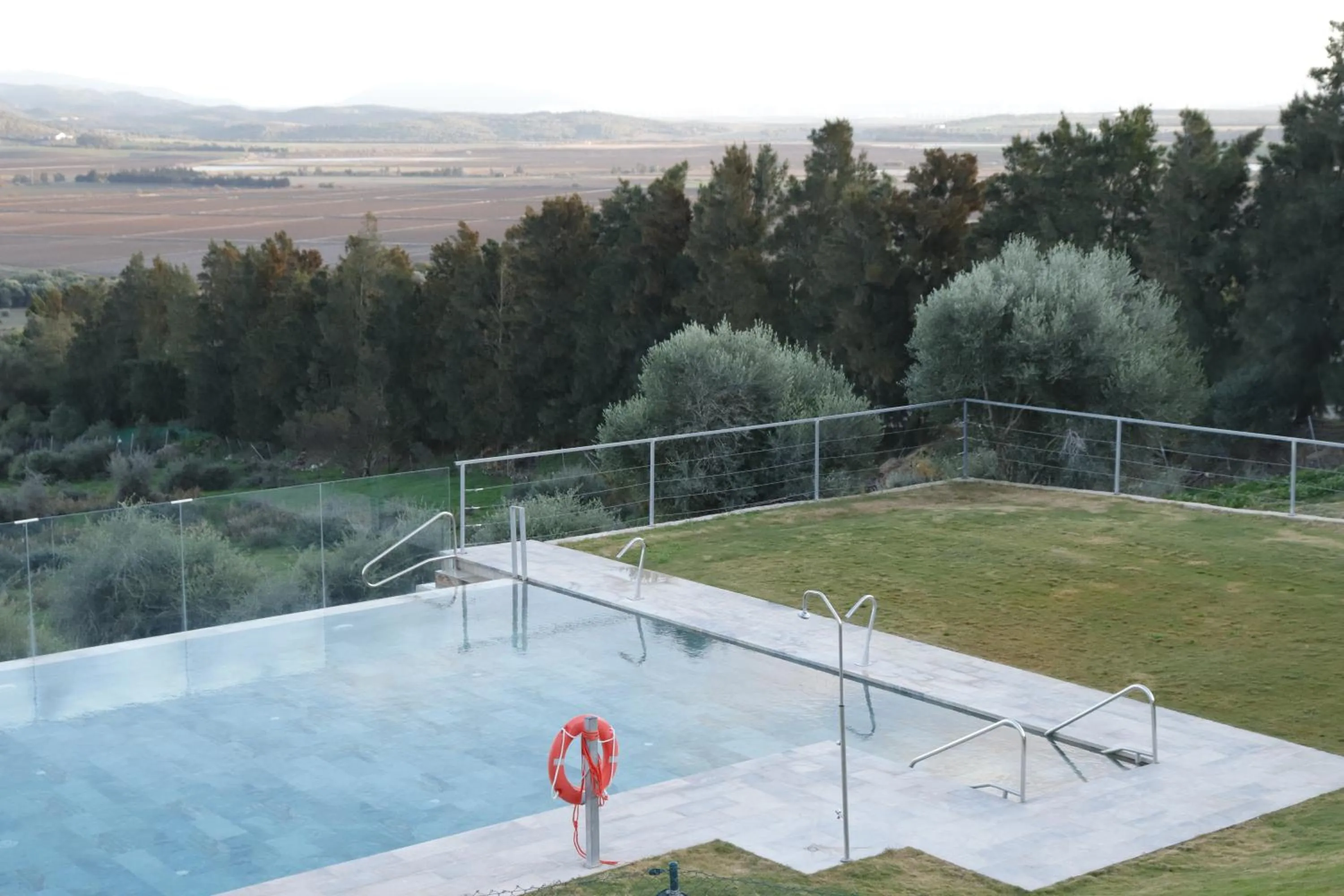 Pool view in Hostal Restaurante Benalup Golf