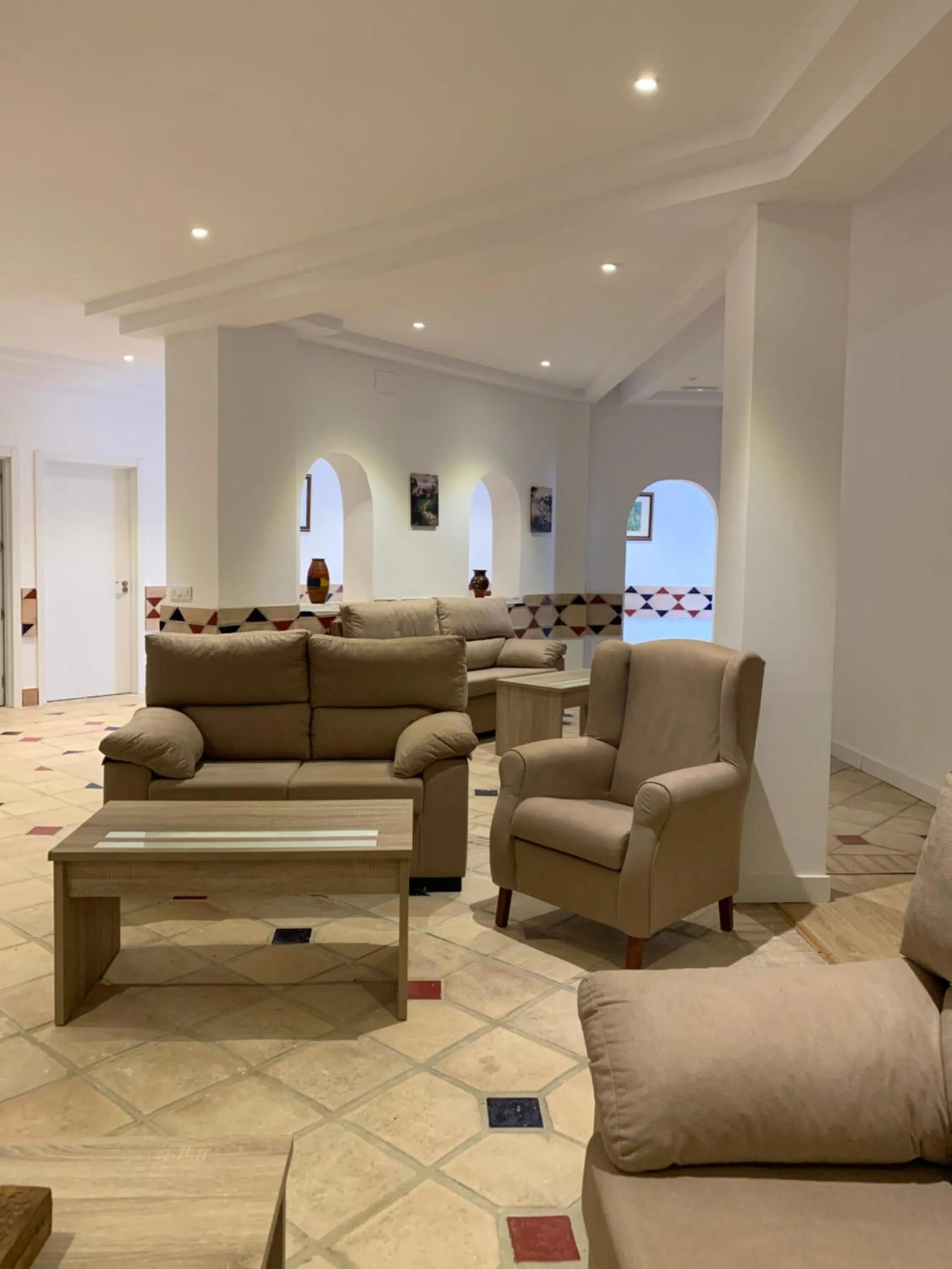 Communal lounge/ TV room in Hostal Restaurante Benalup Golf