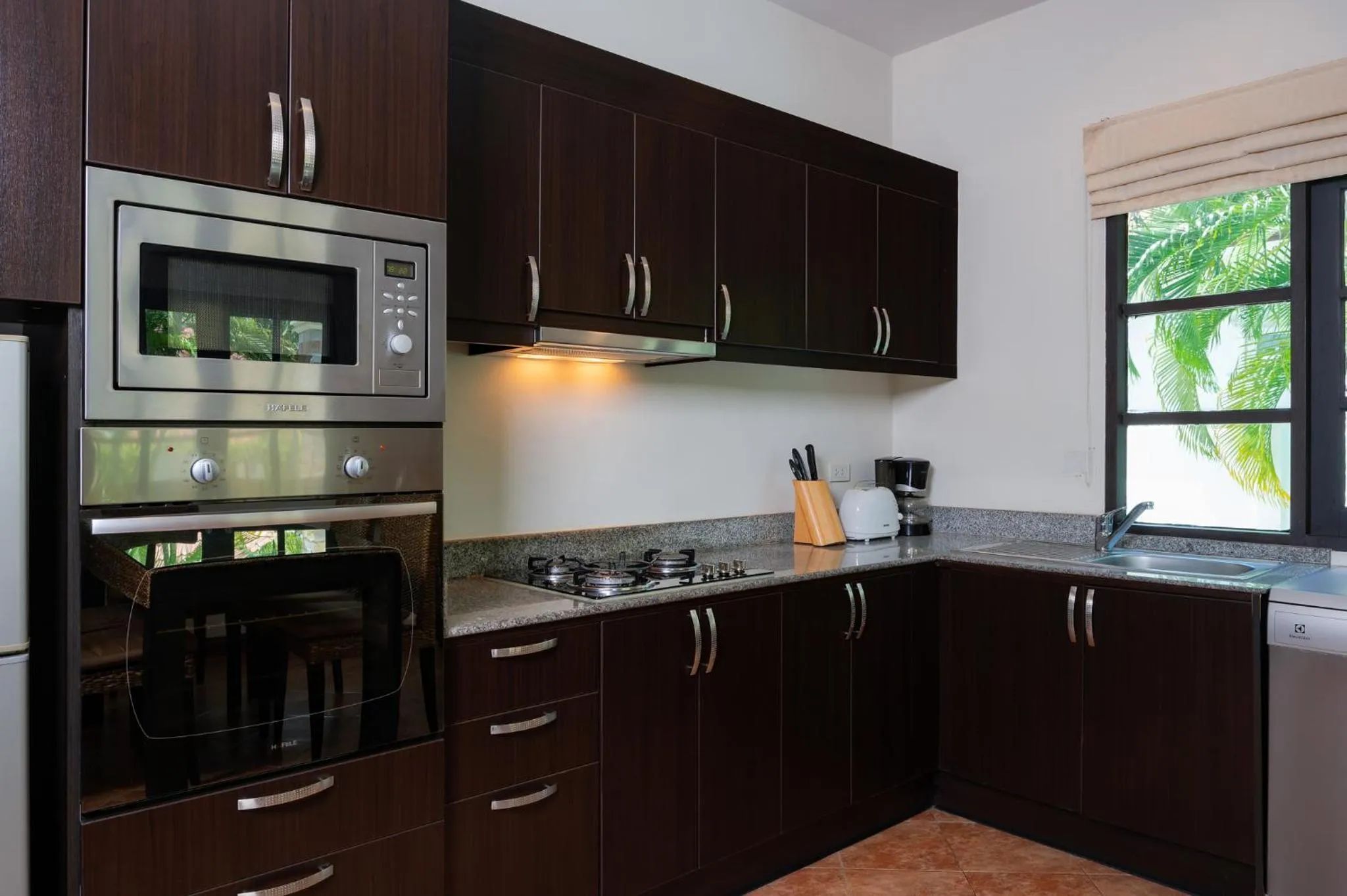 Kitchen or kitchenette in Orchid Paradise Homes OPV 05