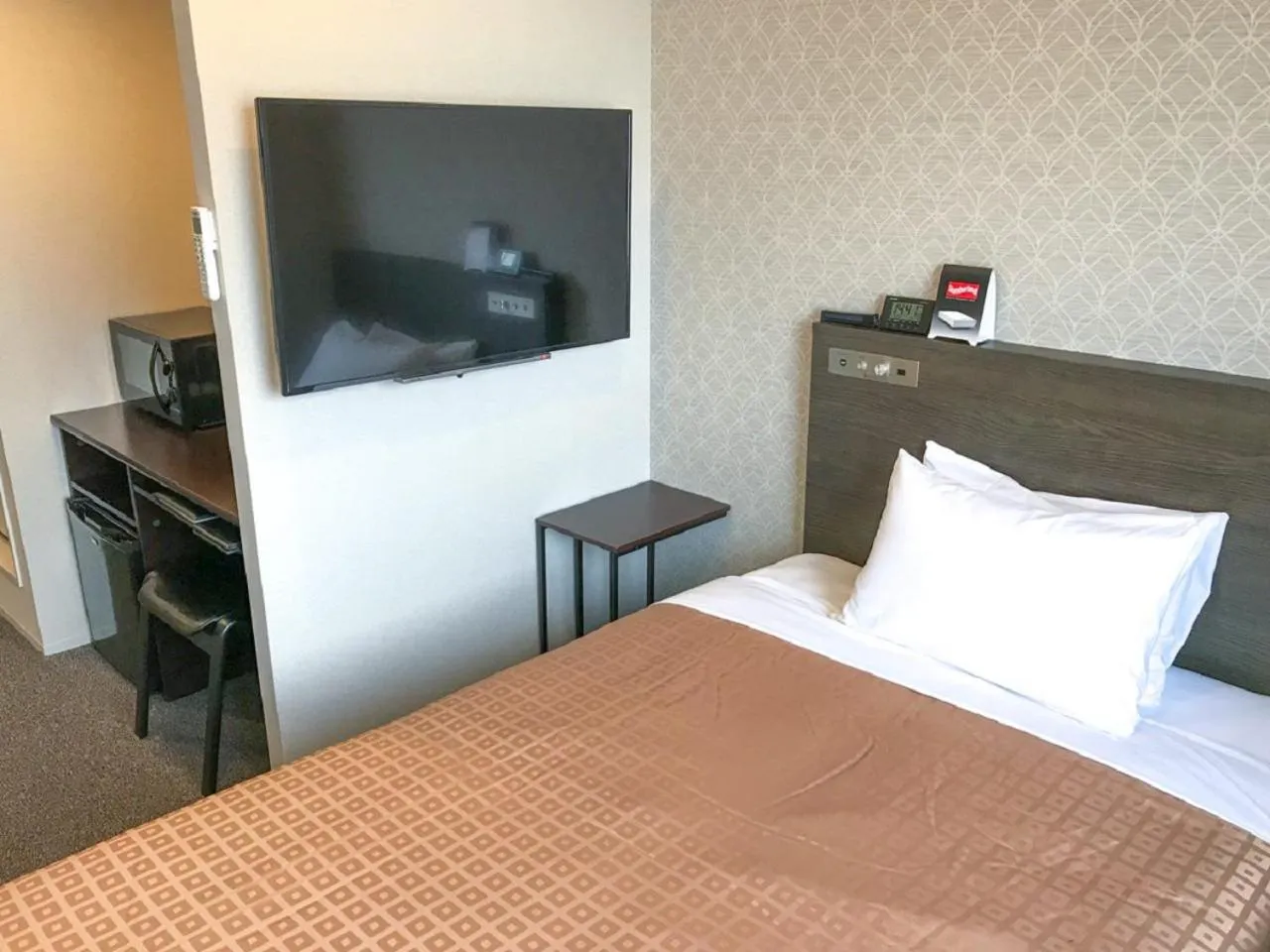 Bed in HOTEL LiVEMAX Chiba Chuo-Ekimae