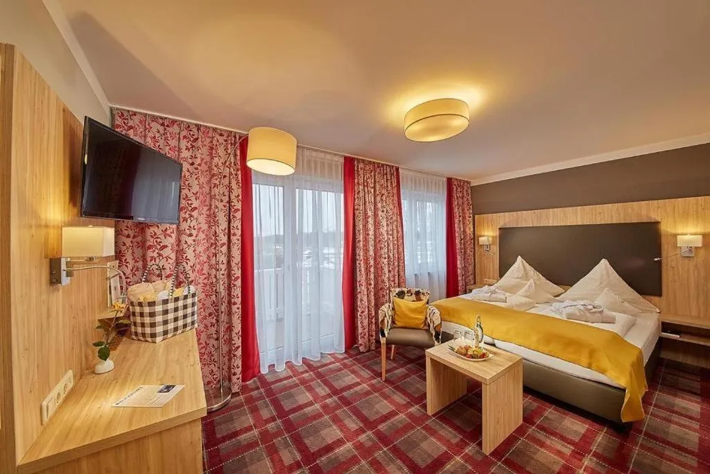 Photo of the whole room, Bed in Ringhotel Sonneck