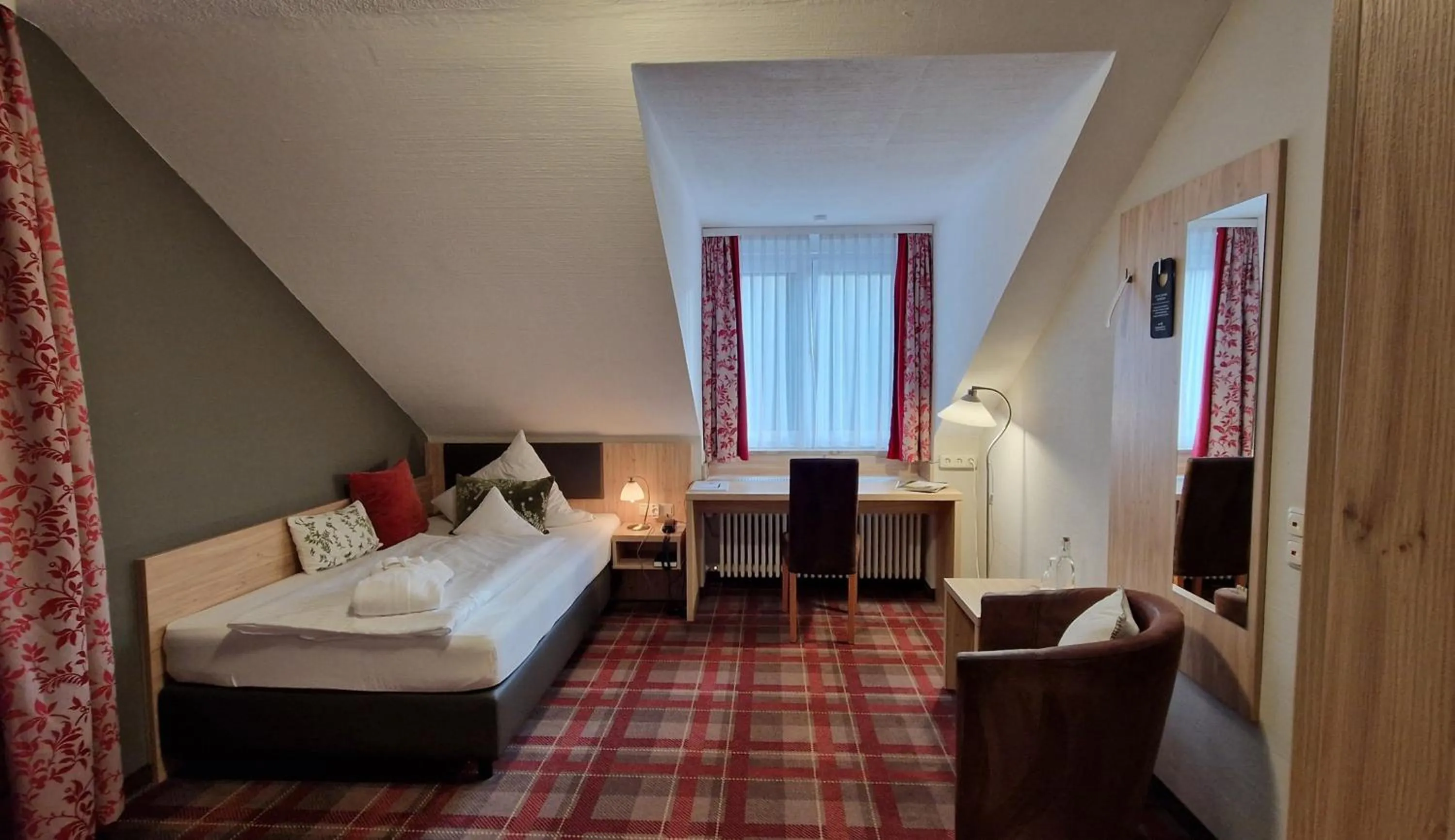 Photo of the whole room, Bed in Ringhotel Sonneck