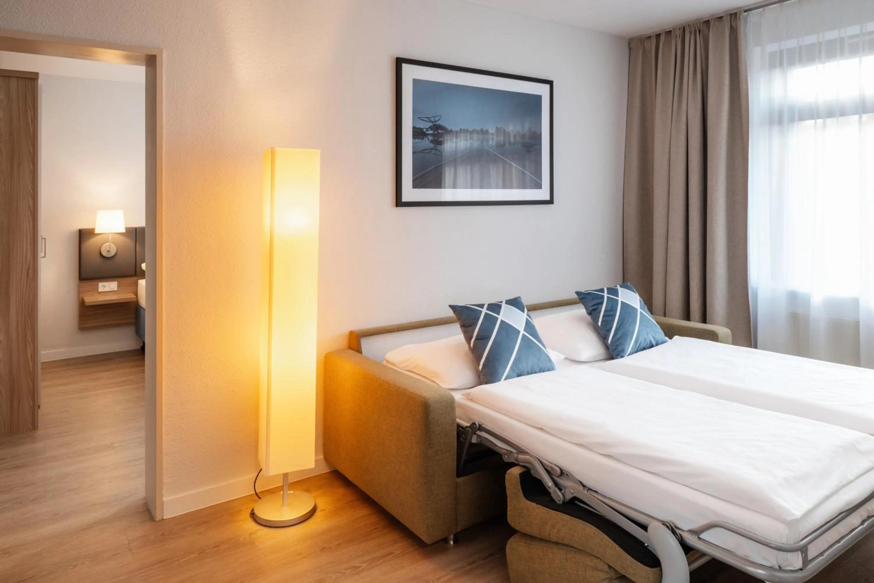 Photo of the whole room, Bed in GHOTEL hotel & living Hannover