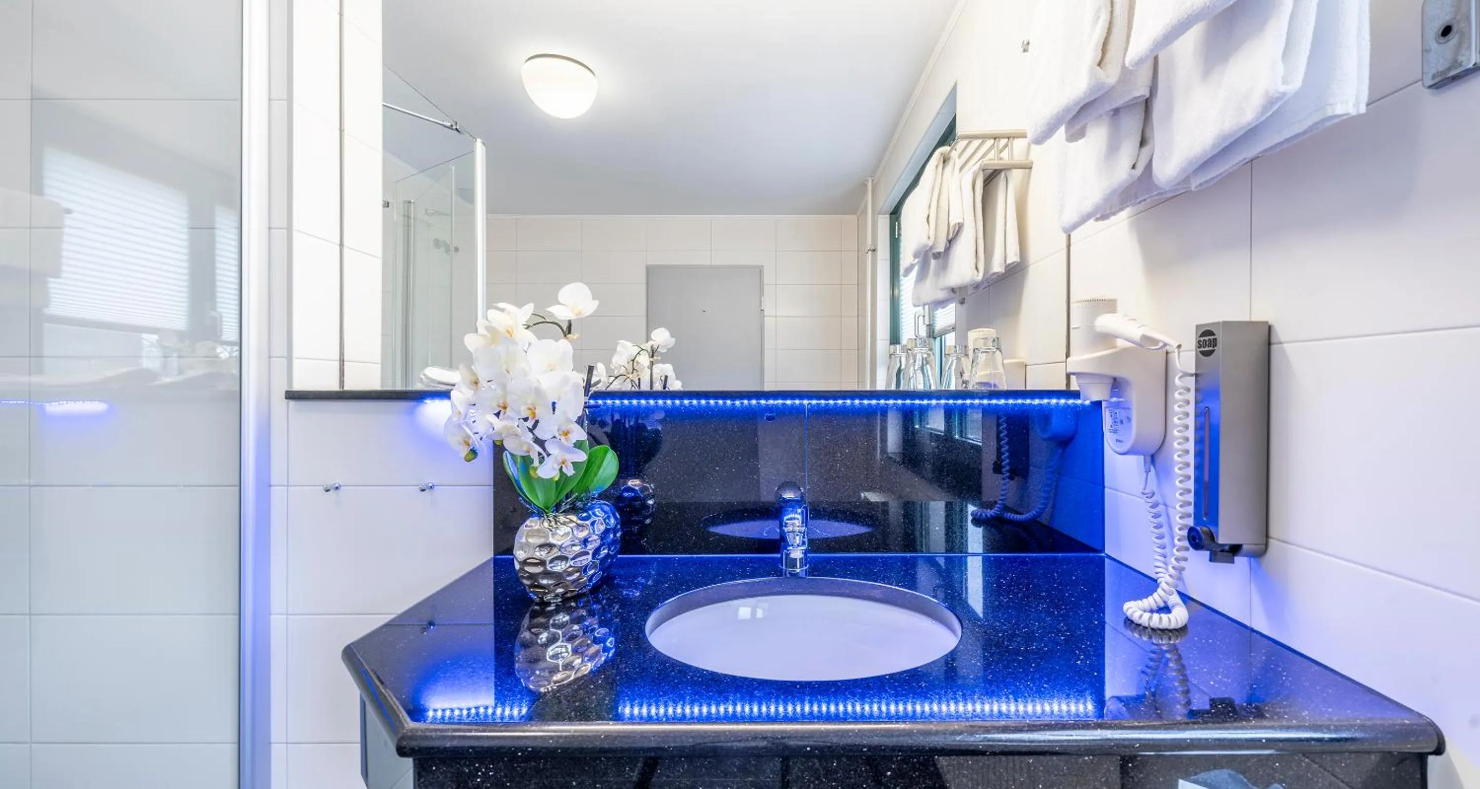 Bathroom in PLAZA INN Braunschweig City Süd