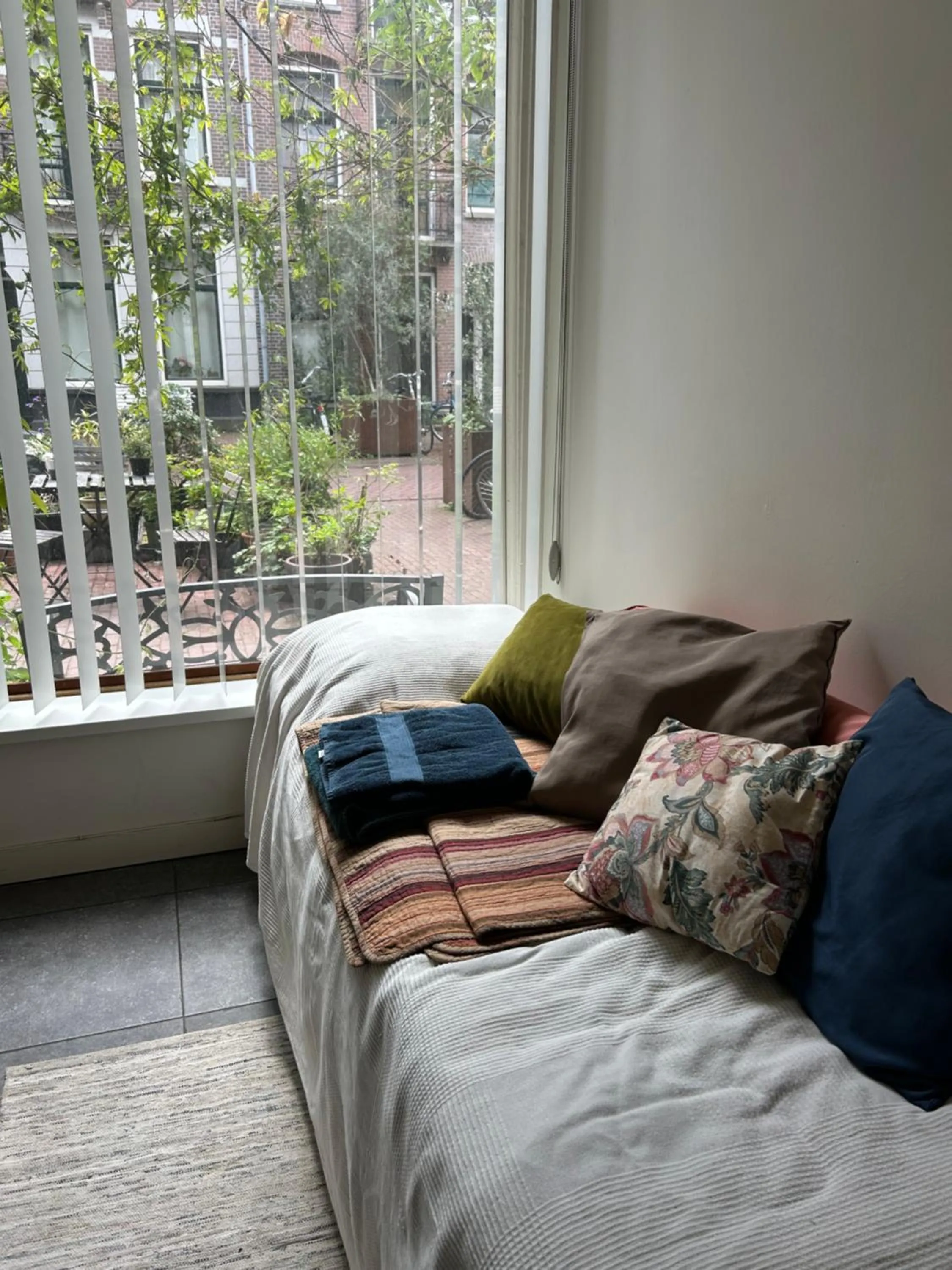 Bed in Marijke's guestroom